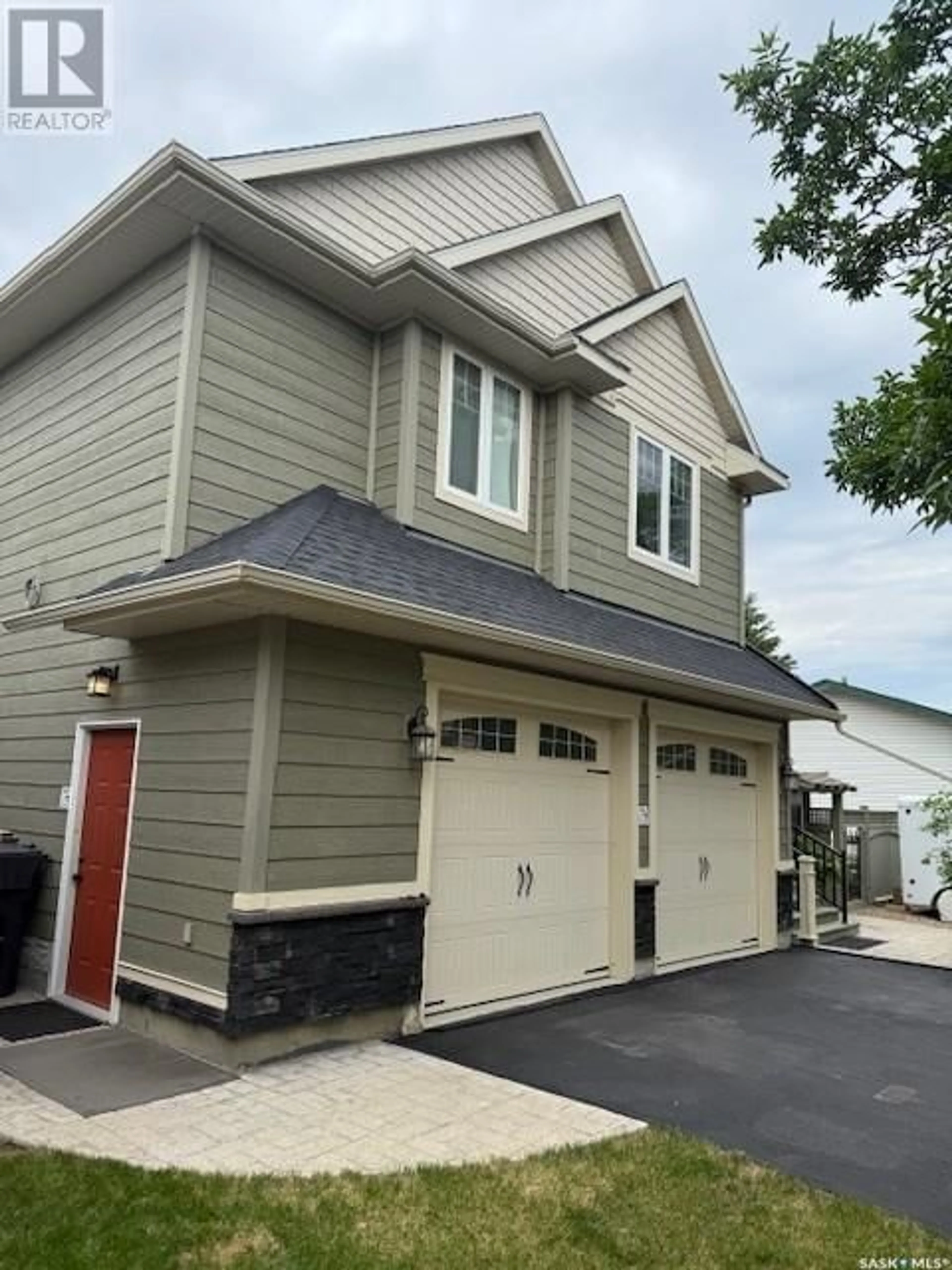Home with vinyl exterior material, street for 11315 CENTENNIAL CRESCENT, North Battleford Saskatchewan S9A3J5