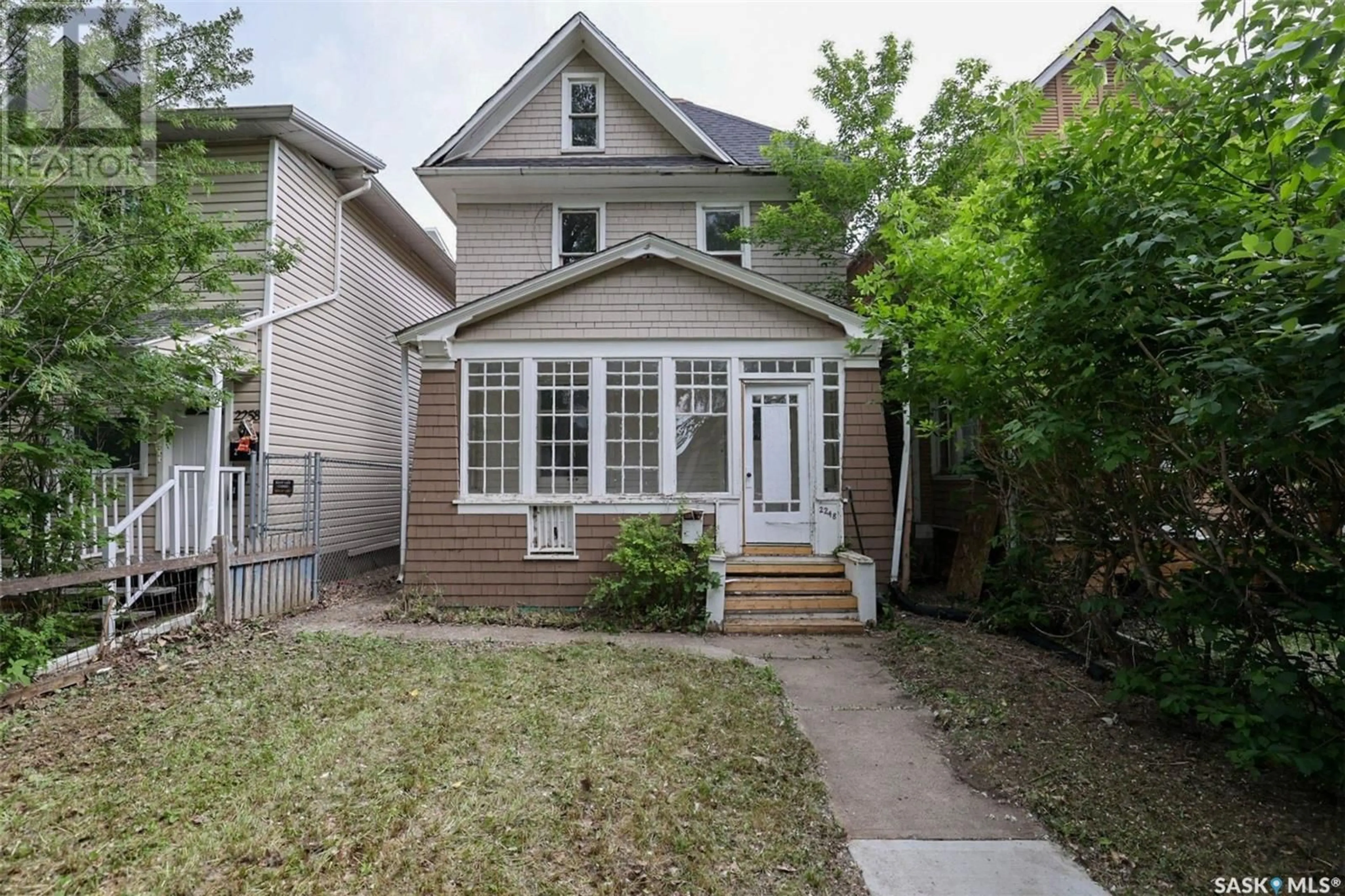 Home with vinyl exterior material, street for 2248 OSLER STREET, Regina Saskatchewan S4P1W8