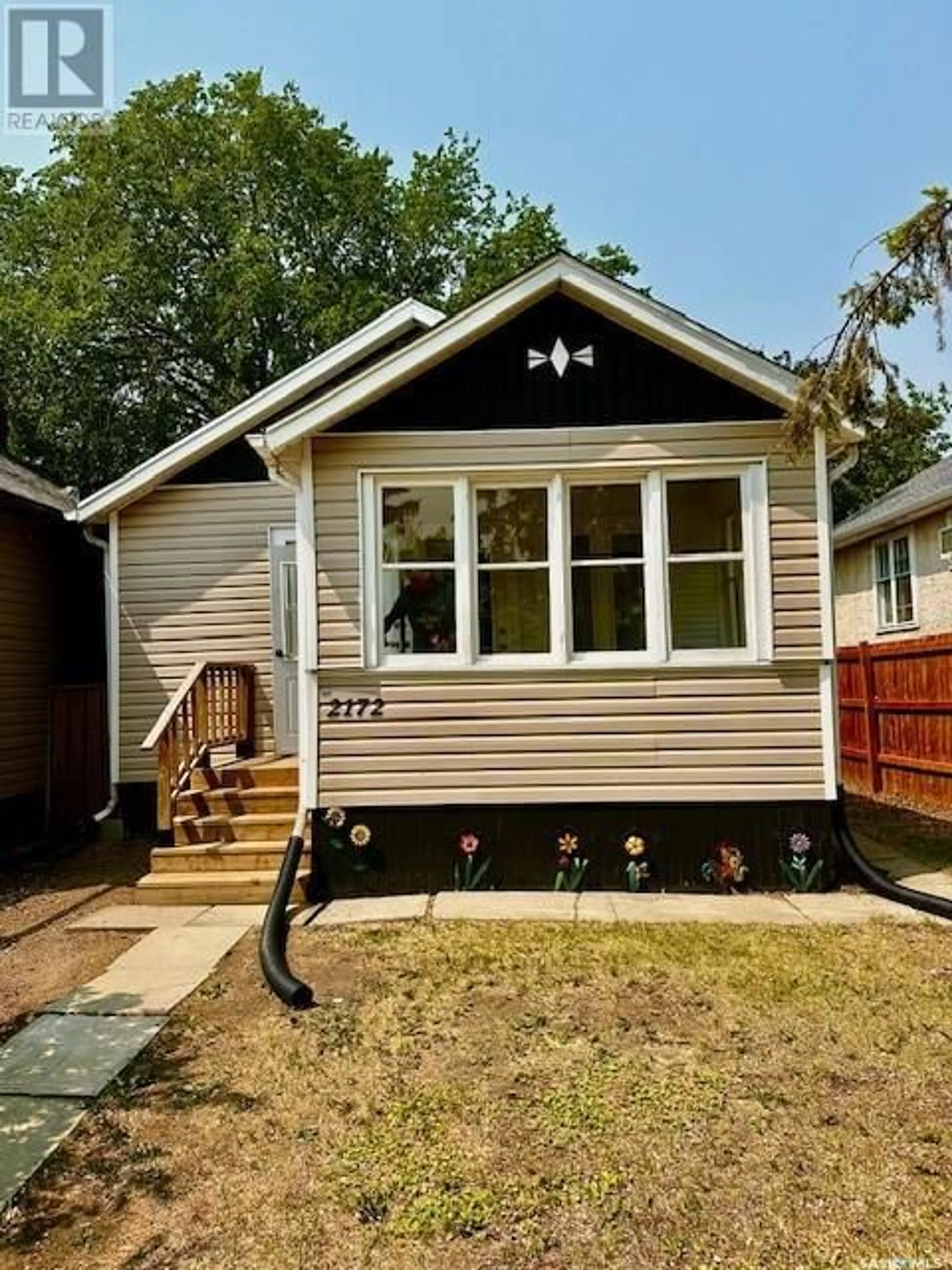 Home with vinyl exterior material, street for 2172 WALLACE STREET, Regina Saskatchewan S4N4A5