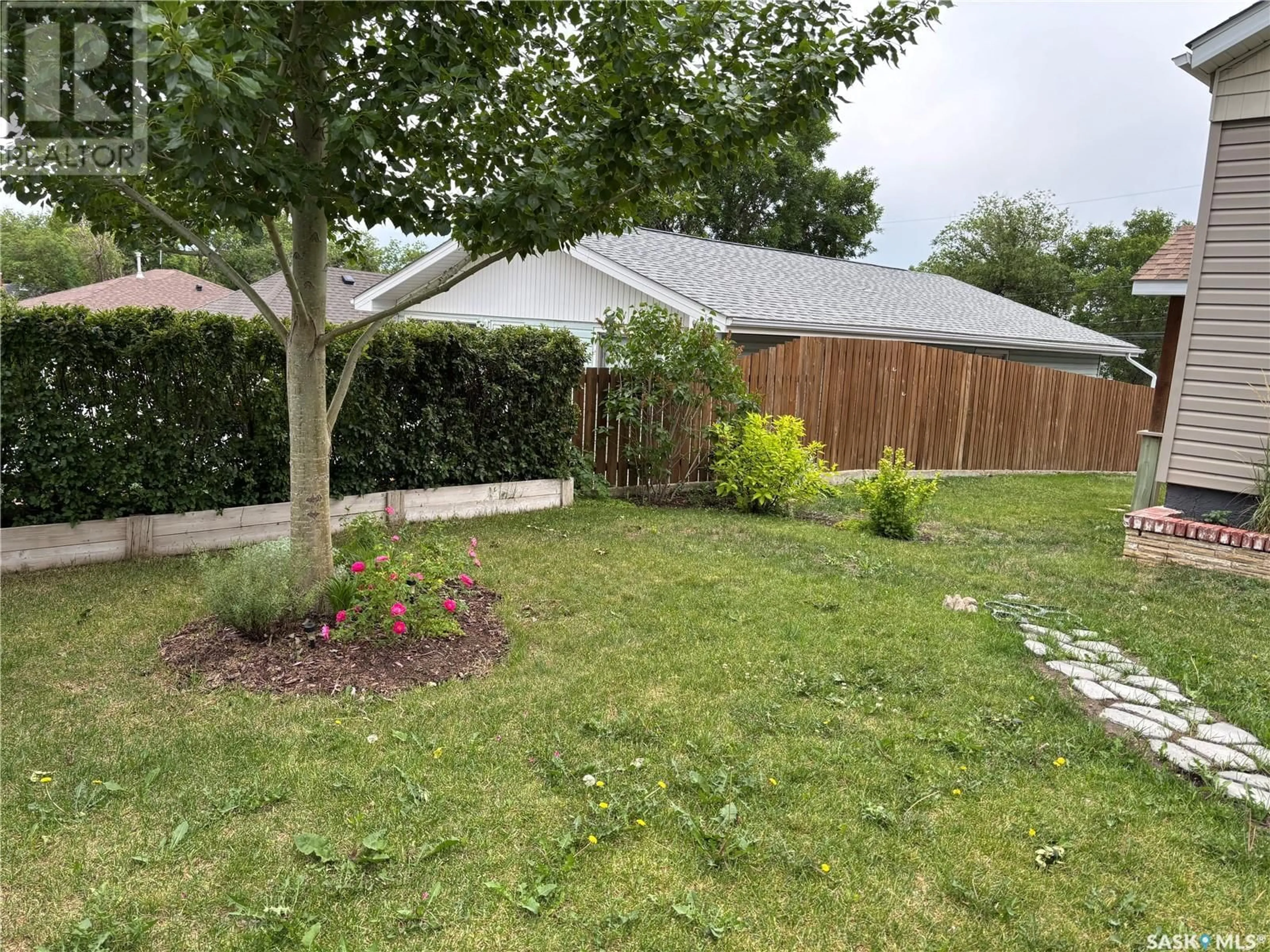 A pic from outside/outdoor area/front of a property/back of a property/a pic from drone, unknown for 358 4TH AVENUE, Swift Current Saskatchewan S9H2J6