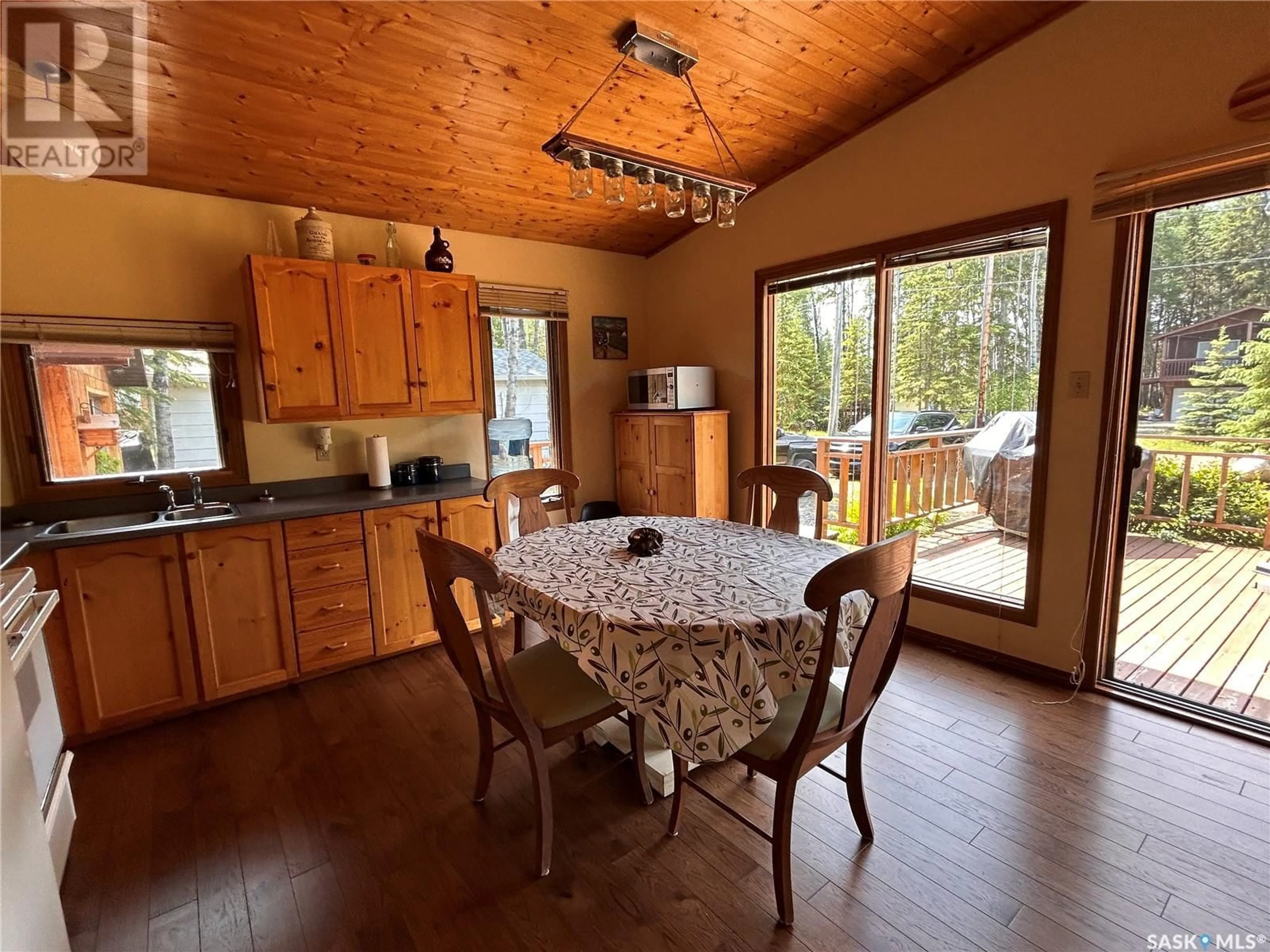 Dining room, wood/laminate floor for 16 CHAMBERLAIN CRESCENT, Candle Lake Saskatchewan S0J3E0