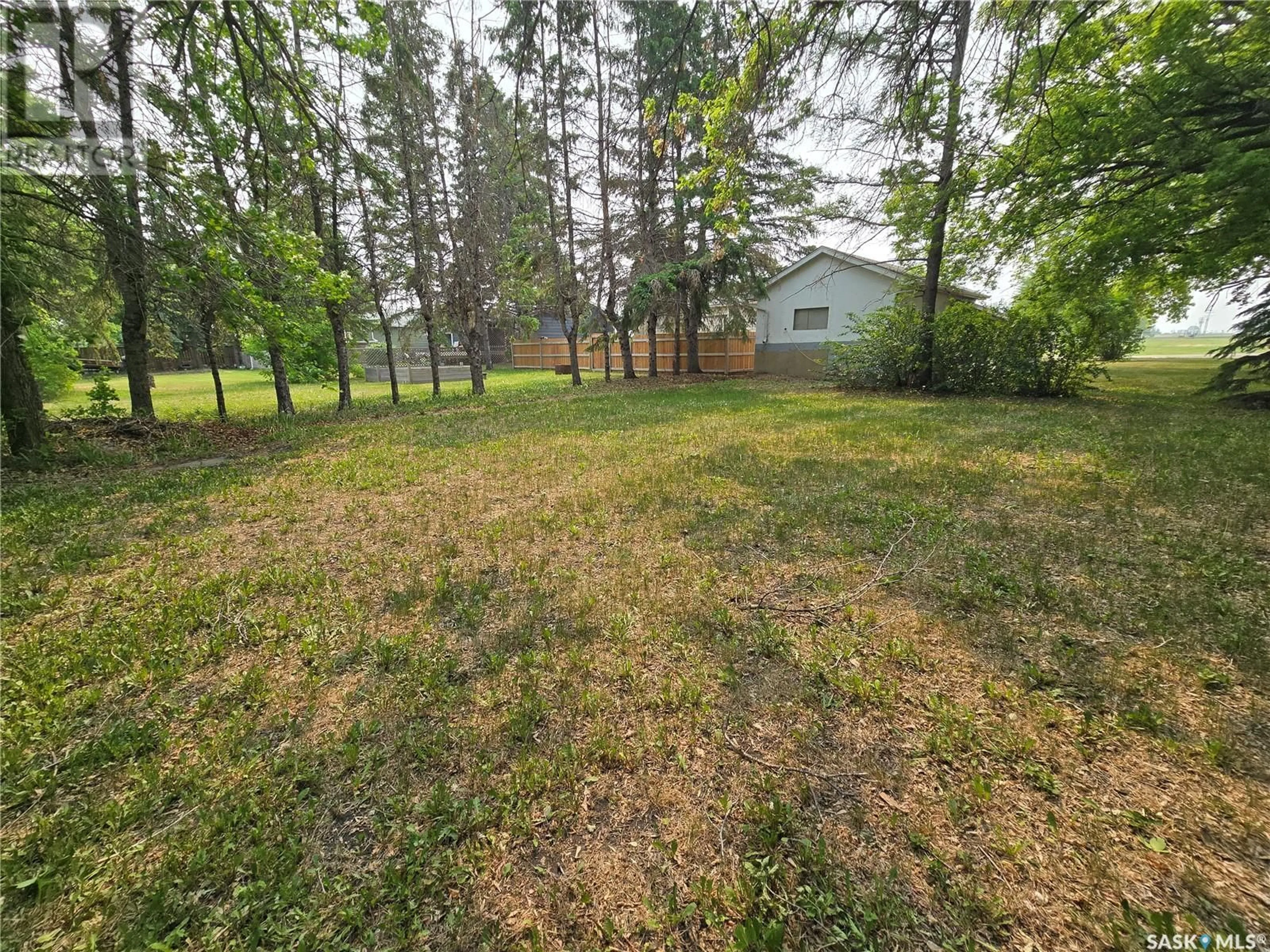 A pic from outside/outdoor area/front of a property/back of a property/a pic from drone, forest/trees view for 414 4TH STREET, Wakaw Saskatchewan S0K4P0