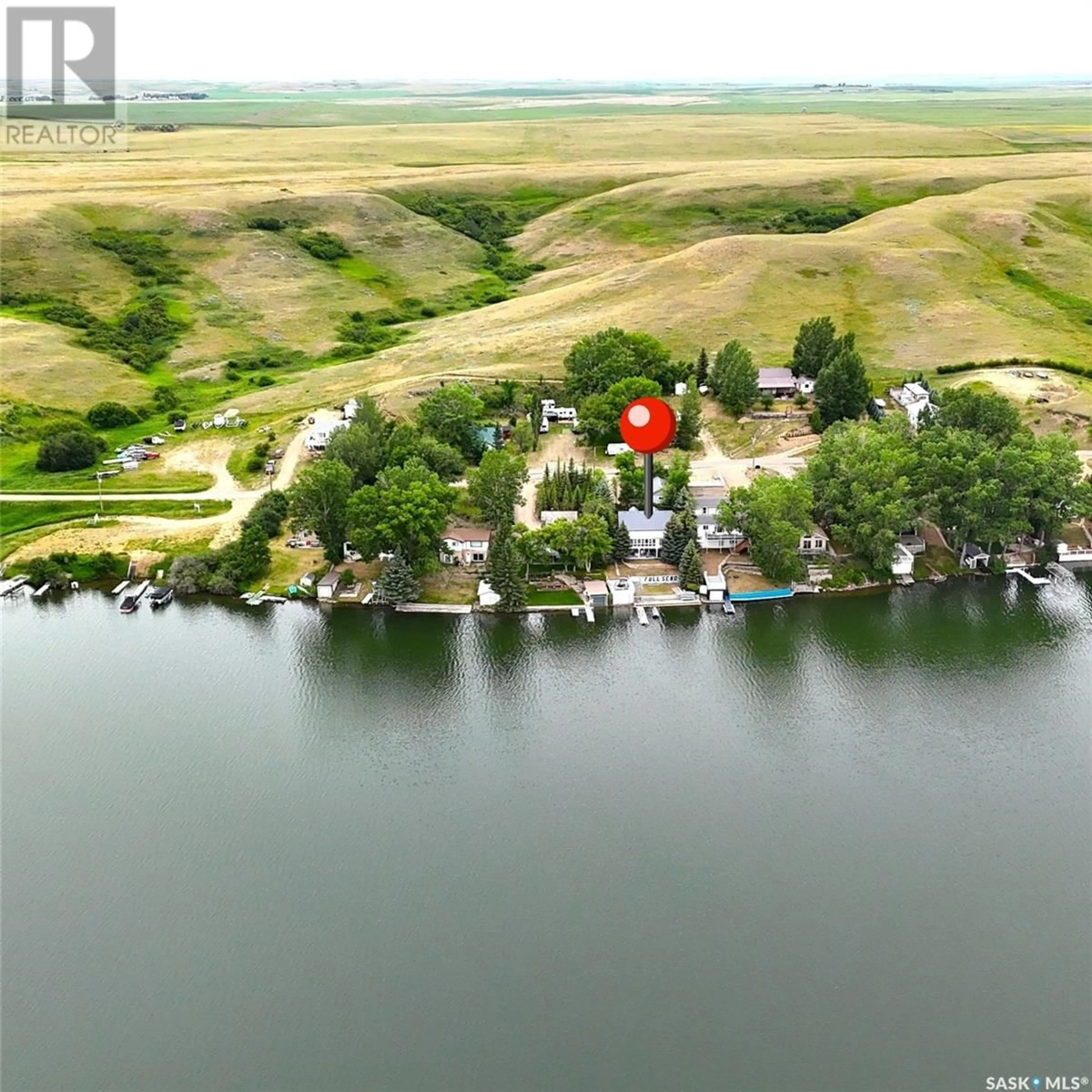A pic from outside/outdoor area/front of a property/back of a property/a pic from drone, water/lake/river/ocean view for 20 PELLETIER DRIVE, Lac Pelletier Rm No. 107 Saskatchewan S0N2Y0