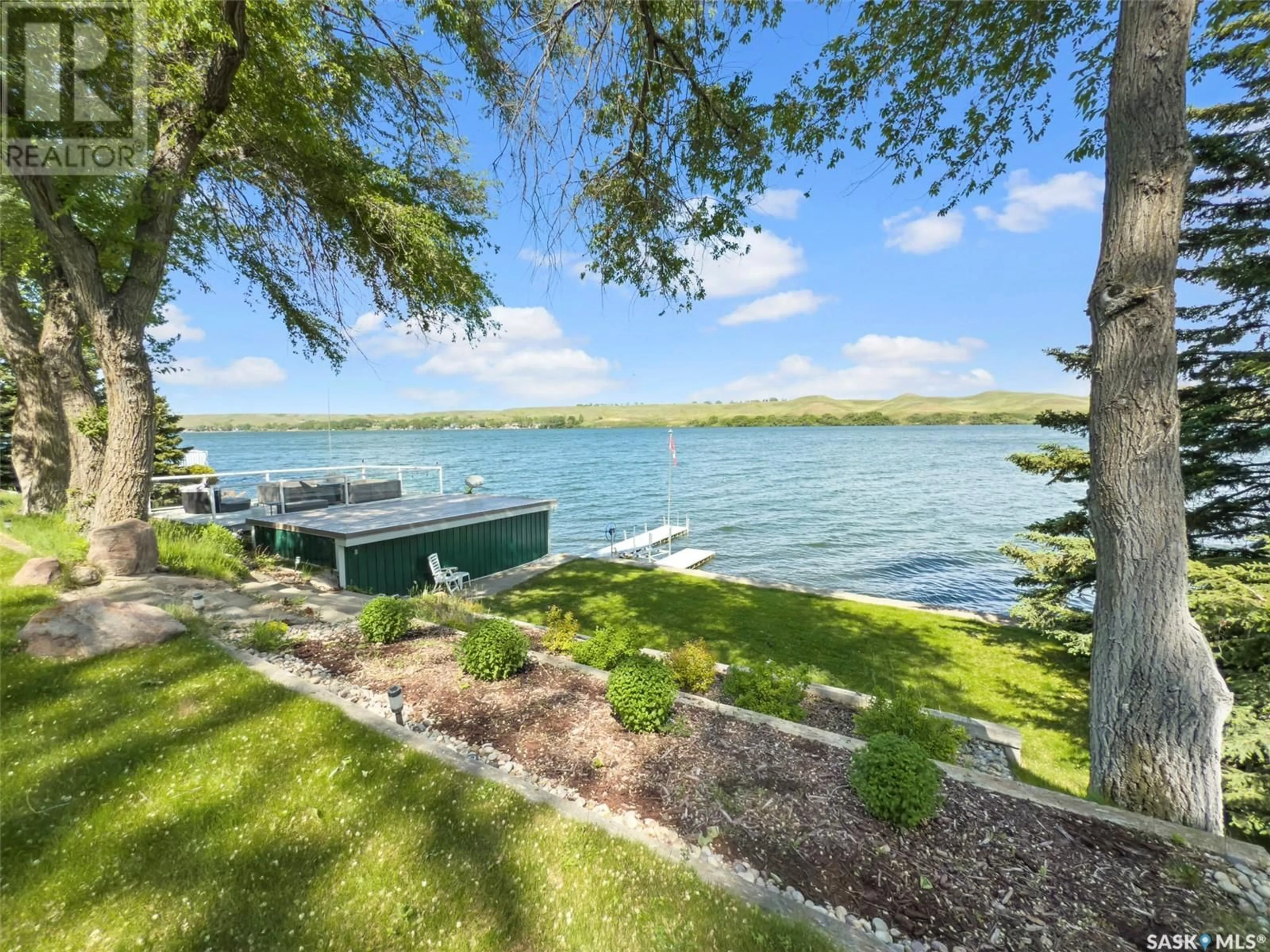 A pic from outside/outdoor area/front of a property/back of a property/a pic from drone, water/lake/river/ocean view for 20 PELLETIER DRIVE, Lac Pelletier Rm No. 107 Saskatchewan S0N2Y0