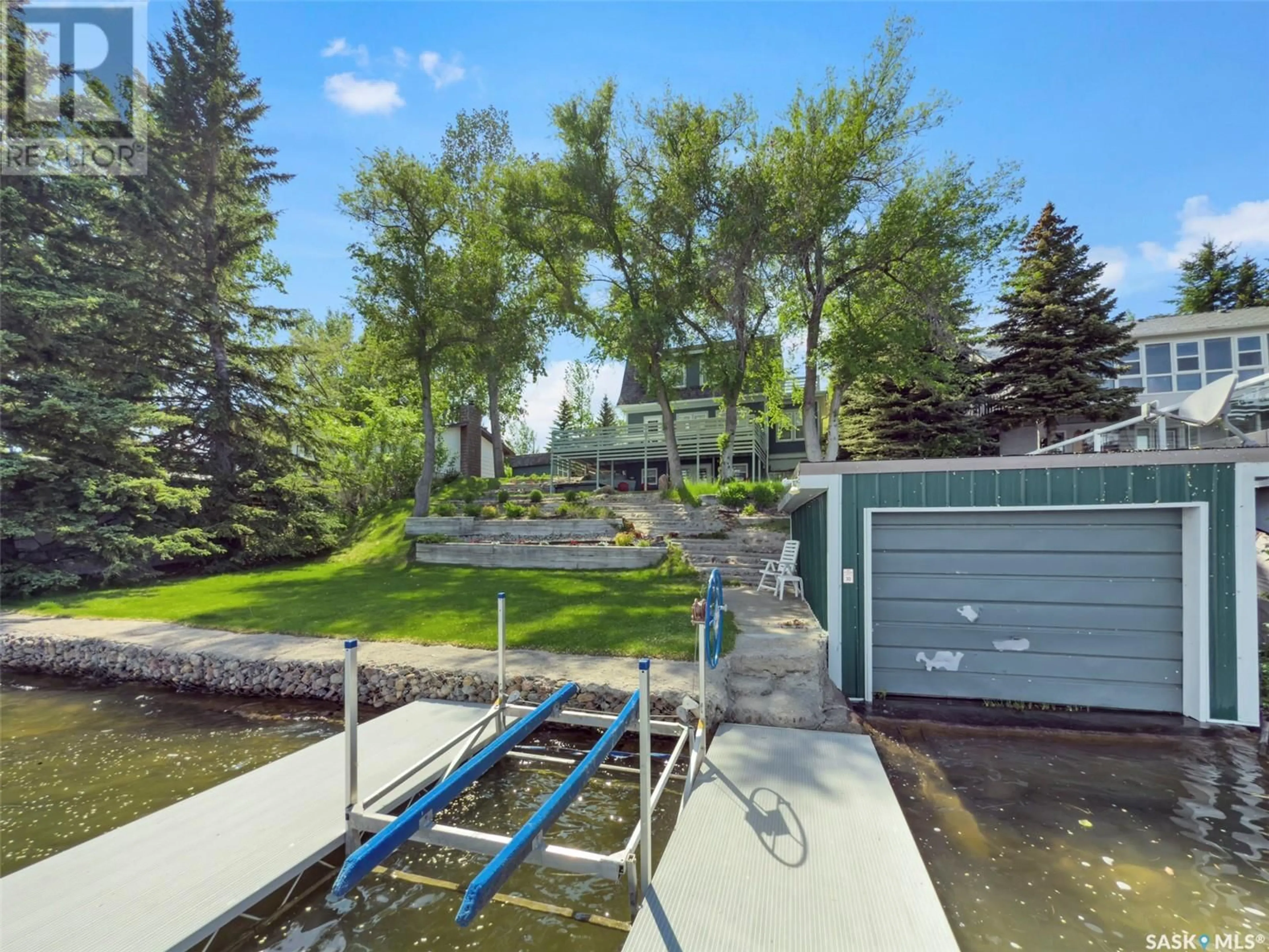 A pic from outside/outdoor area/front of a property/back of a property/a pic from drone, water/lake/river/ocean view for 20 PELLETIER DRIVE, Lac Pelletier Rm No. 107 Saskatchewan S0N2Y0