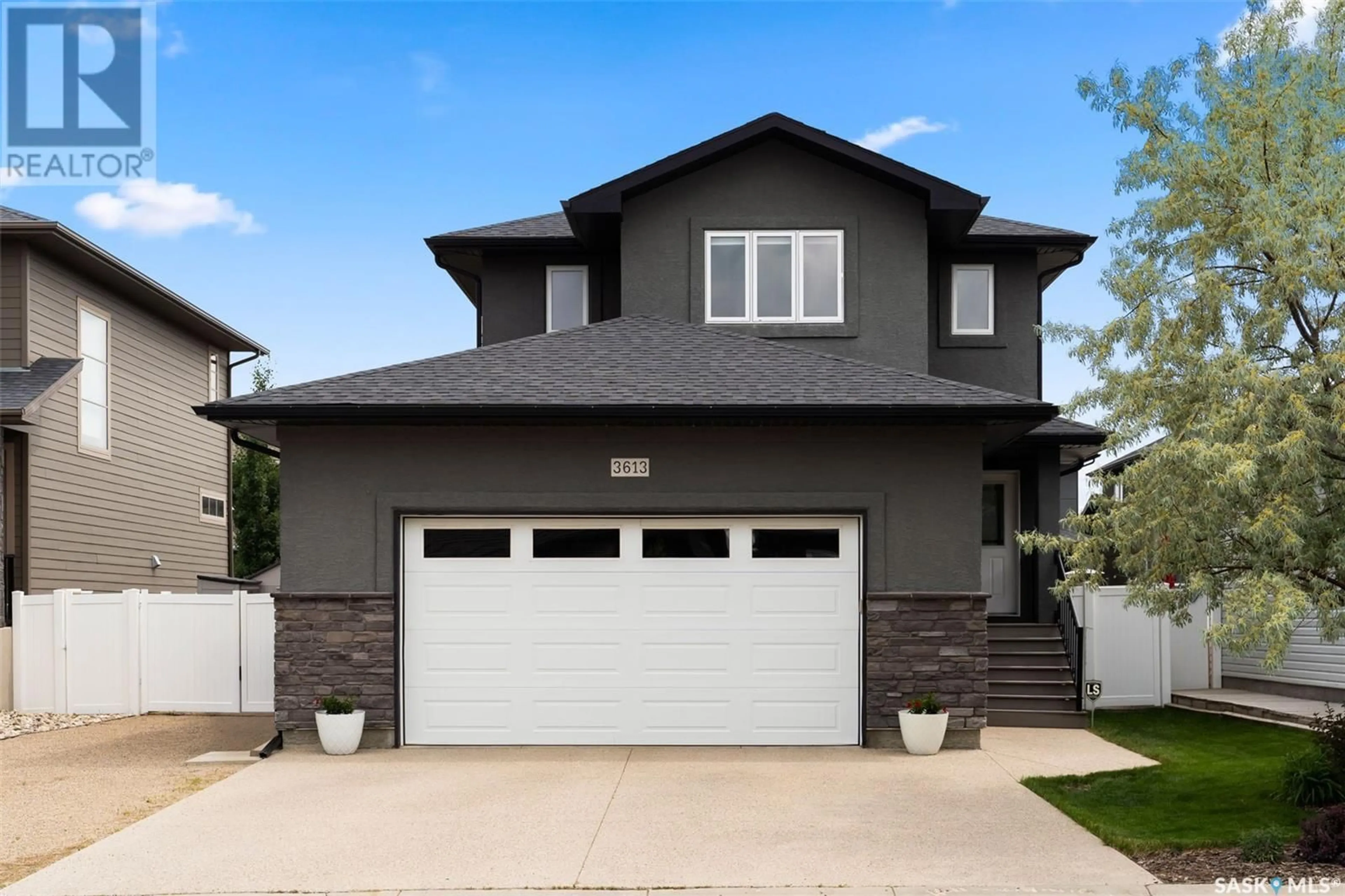 Home with vinyl exterior material, street for 3613 GREEN WATER DRIVE, Regina Saskatchewan S4V1R3