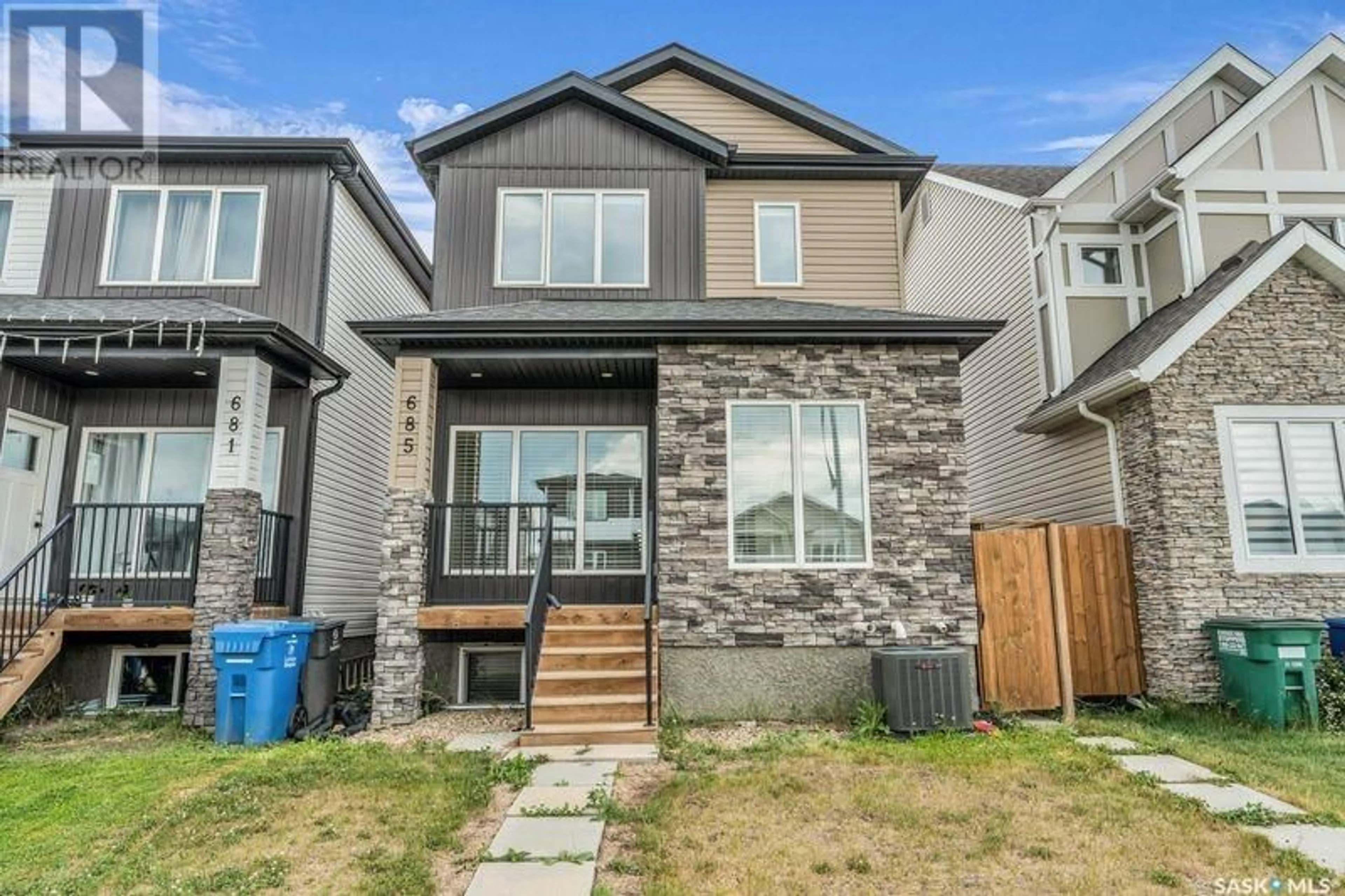 Home with brick exterior material, street for 685 FEHEREGYHAZI BOULEVARD, Saskatoon Saskatchewan S7W0Y3