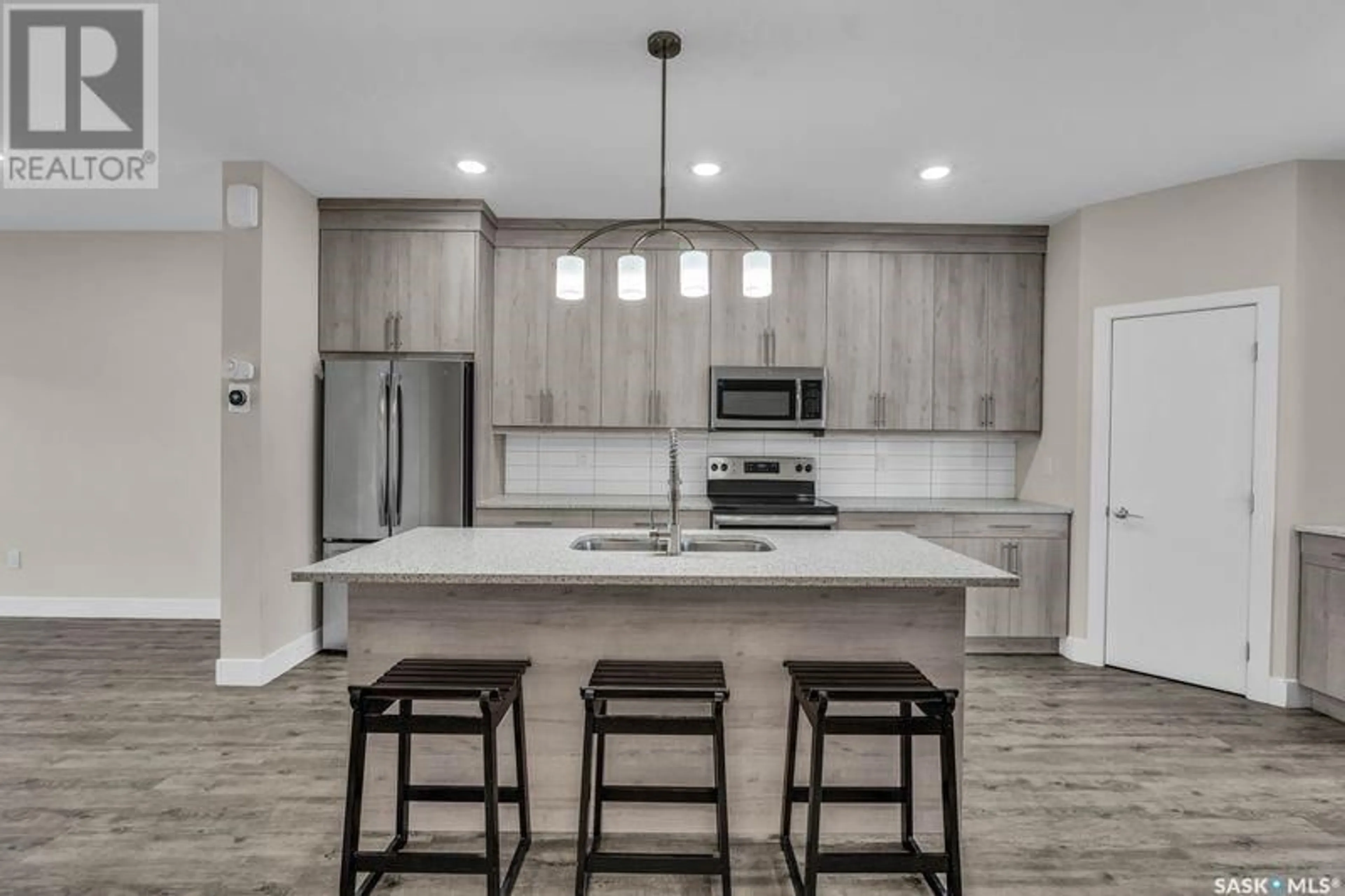 Open concept kitchen, unknown for 685 FEHEREGYHAZI BOULEVARD, Saskatoon Saskatchewan S7W0Y3