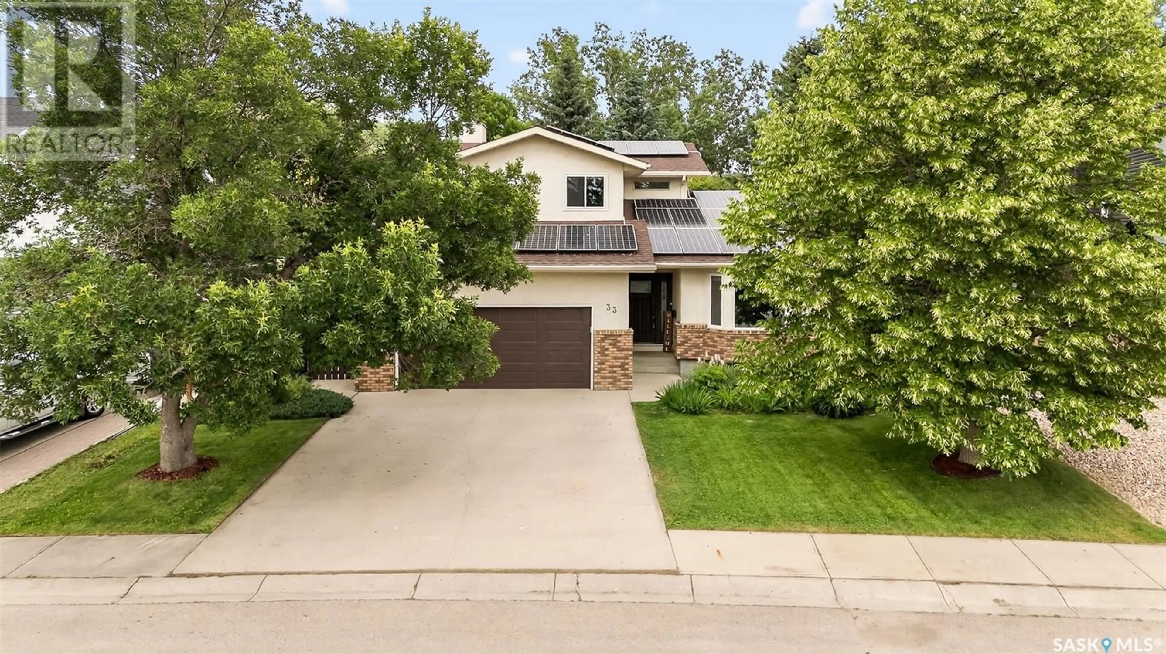 Home with brick exterior material, street for 33 ELISIA DRIVE, Moose Jaw Saskatchewan S6J1G9