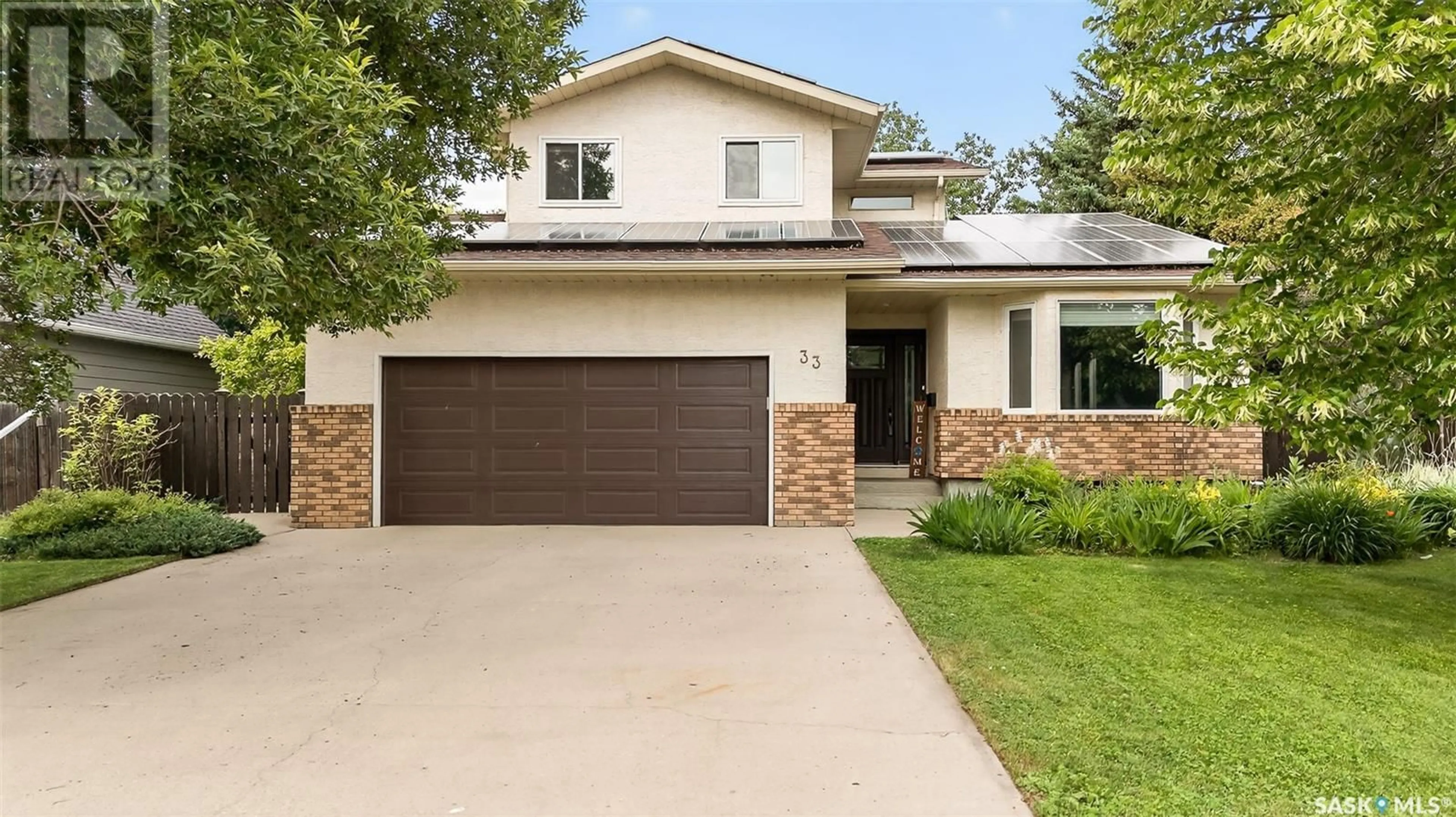 Home with brick exterior material, street for 33 ELISIA DRIVE, Moose Jaw Saskatchewan S6J1G9