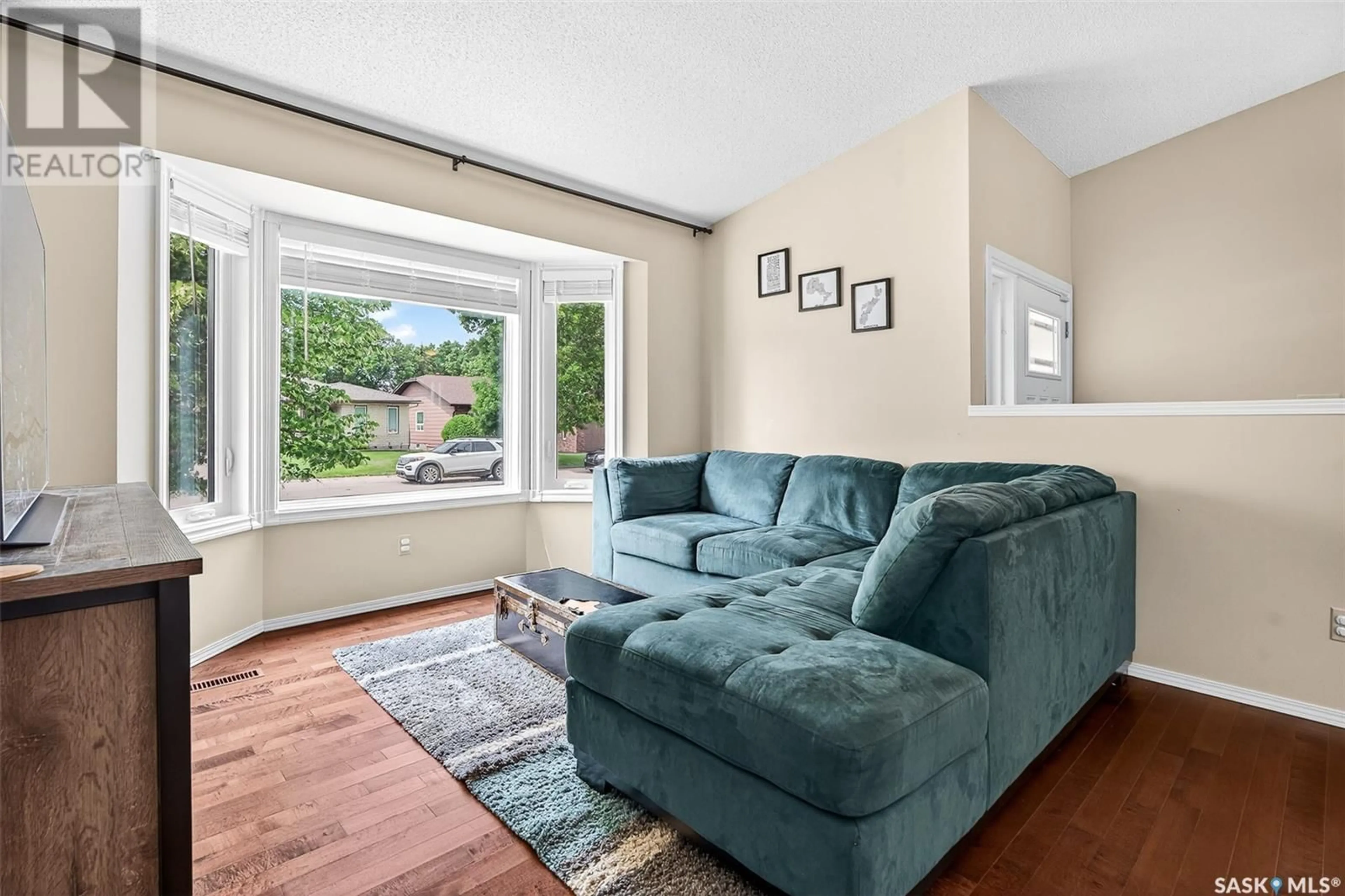 Living room with furniture, unknown for 33 ELISIA DRIVE, Moose Jaw Saskatchewan S6J1G9
