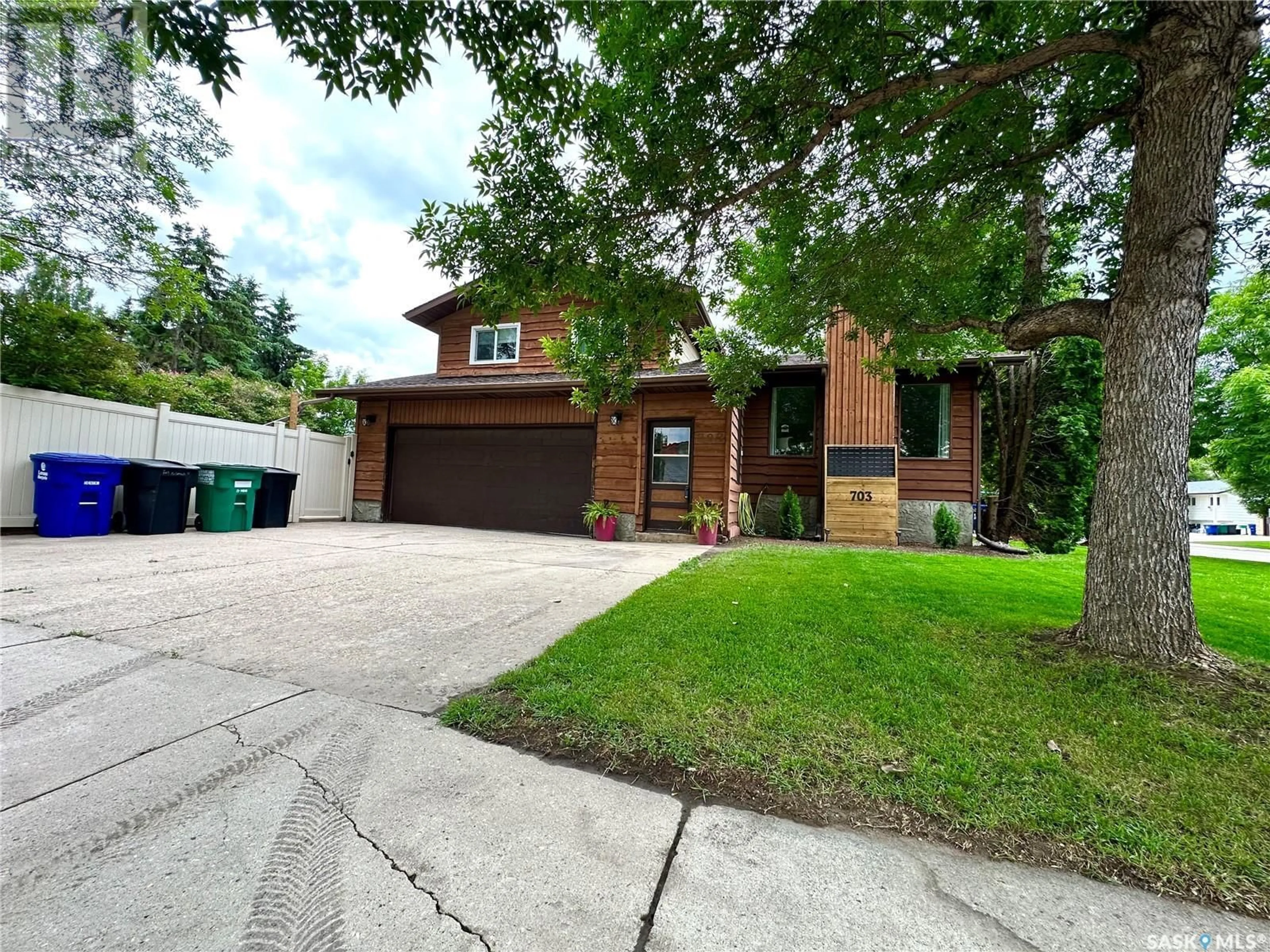 Home with brick exterior material, street for 703 MCCORMACK ROAD, Saskatoon Saskatchewan S7M5B9