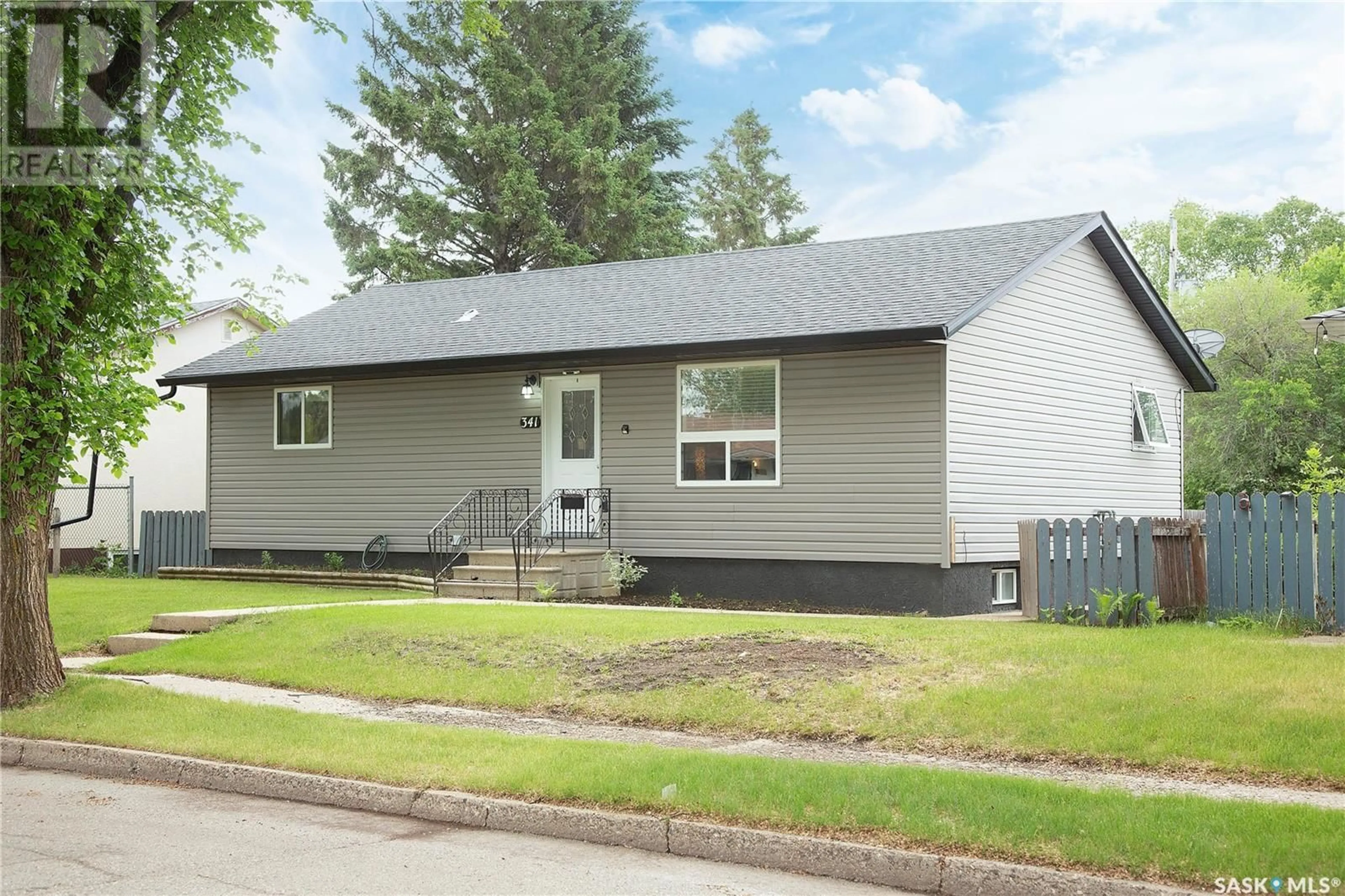 Home with vinyl exterior material, street for 341 23RD STREET, Prince Albert Saskatchewan S6V4L9