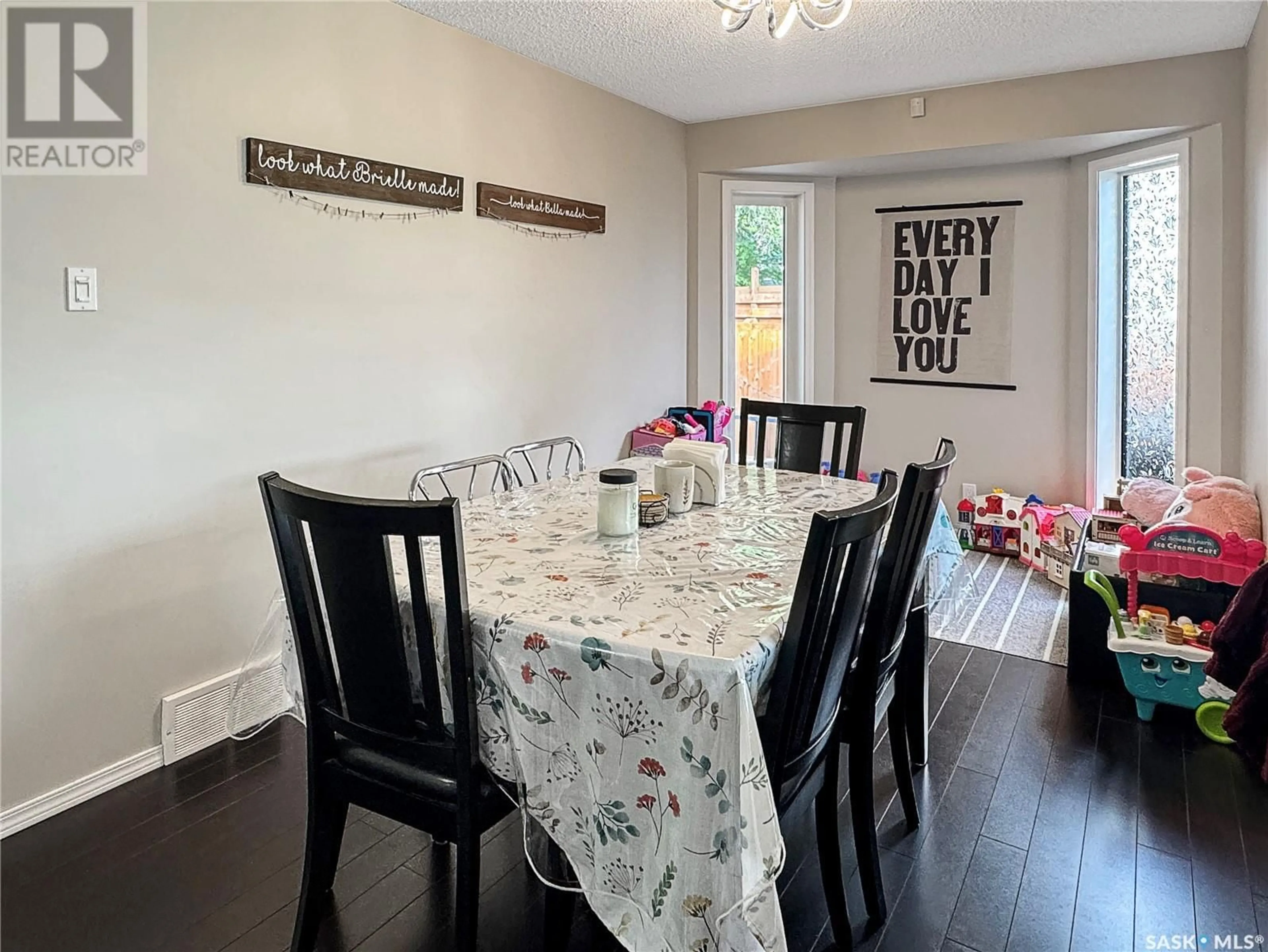 Dining room, wood/laminate floor for 261 RIVERBEND CRESCENT, Battleford Saskatchewan S0M0E0