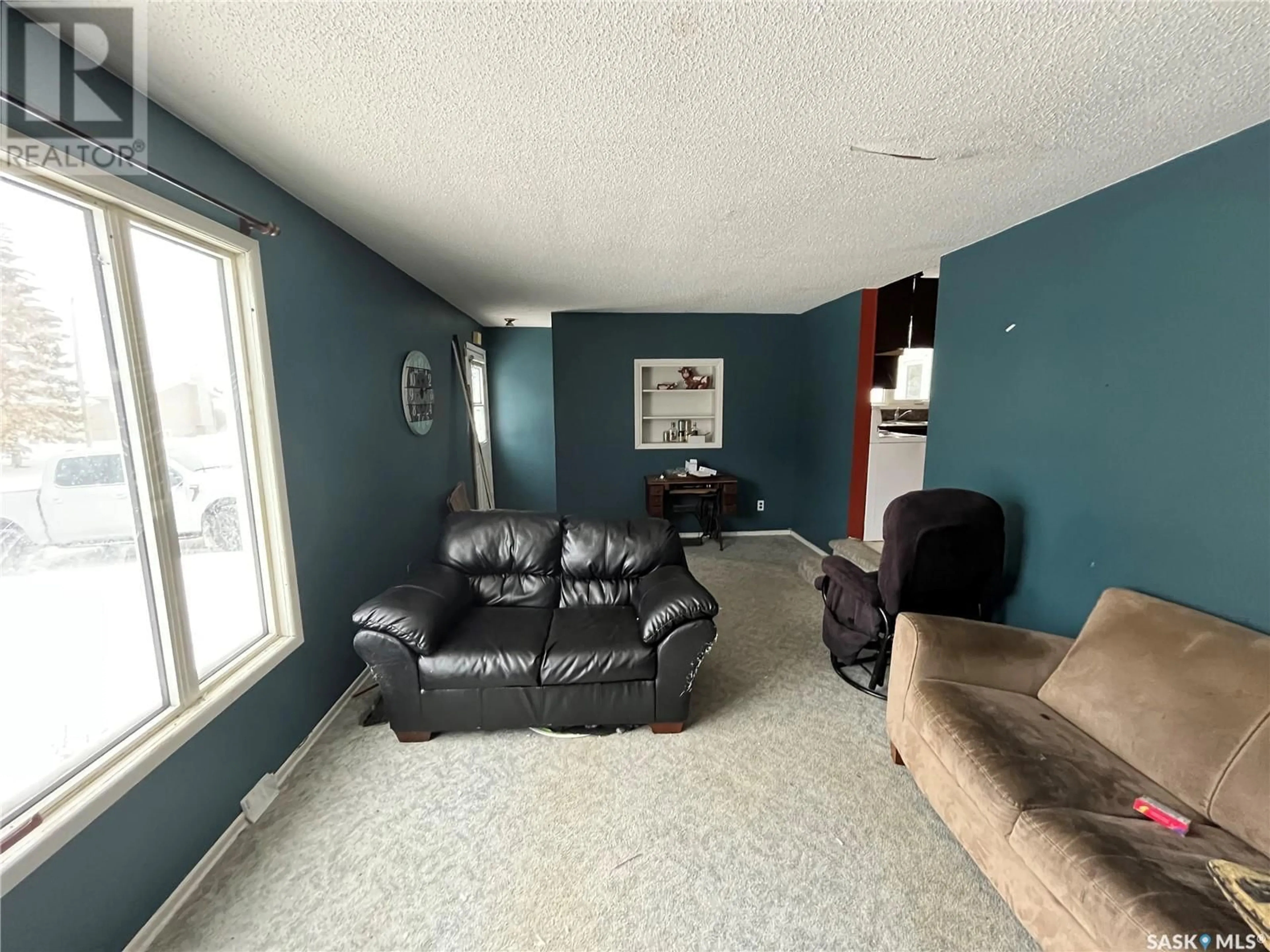 Living room with furniture, unknown for 7 WAUCHOPE STREET, Redvers Saskatchewan S0C2H0