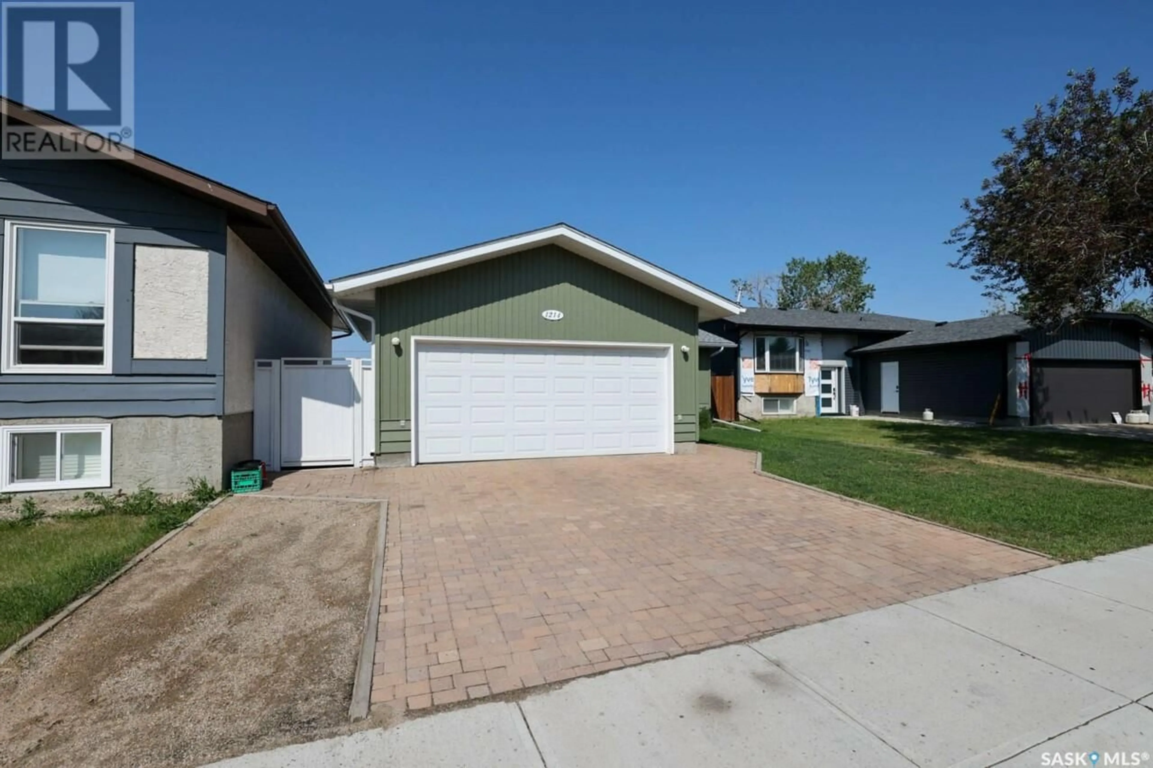 Home with vinyl exterior material, street for 1214 BUTTERFIELD CRESCENT, Regina Saskatchewan S4R1X8