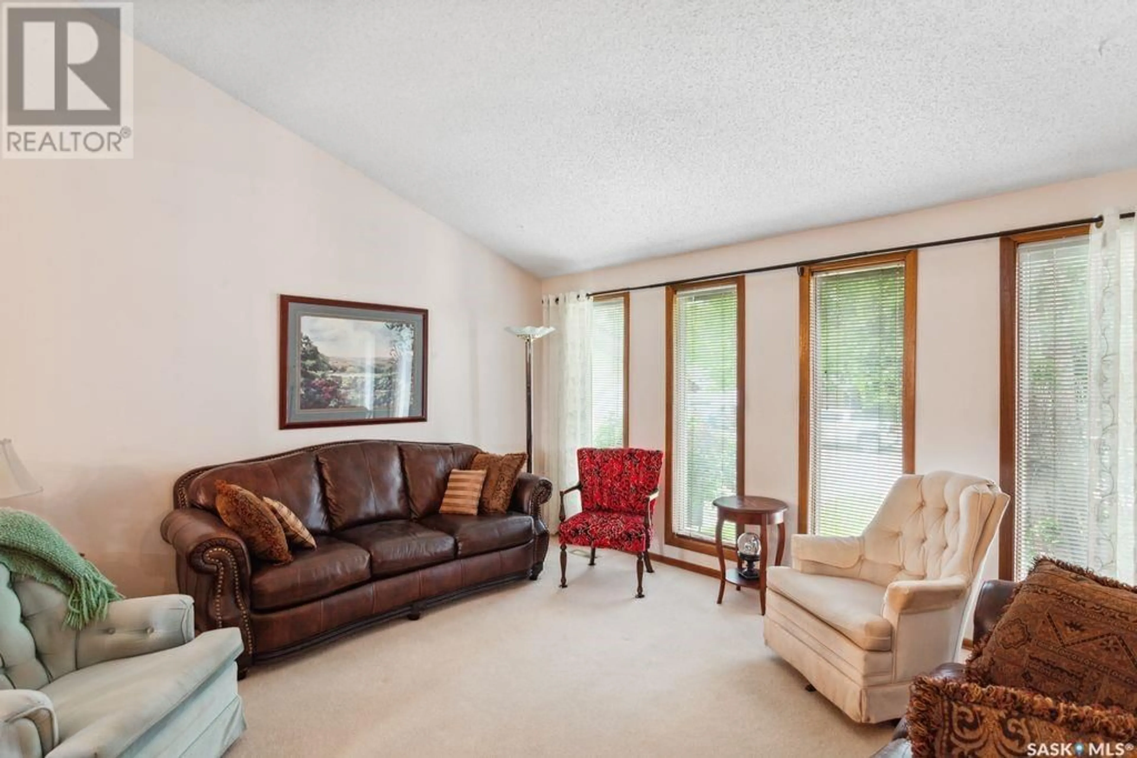 Living room with furniture, unknown for 134 POSTNIKOFF CRESCENT, Saskatoon Saskatchewan S7M4Z3