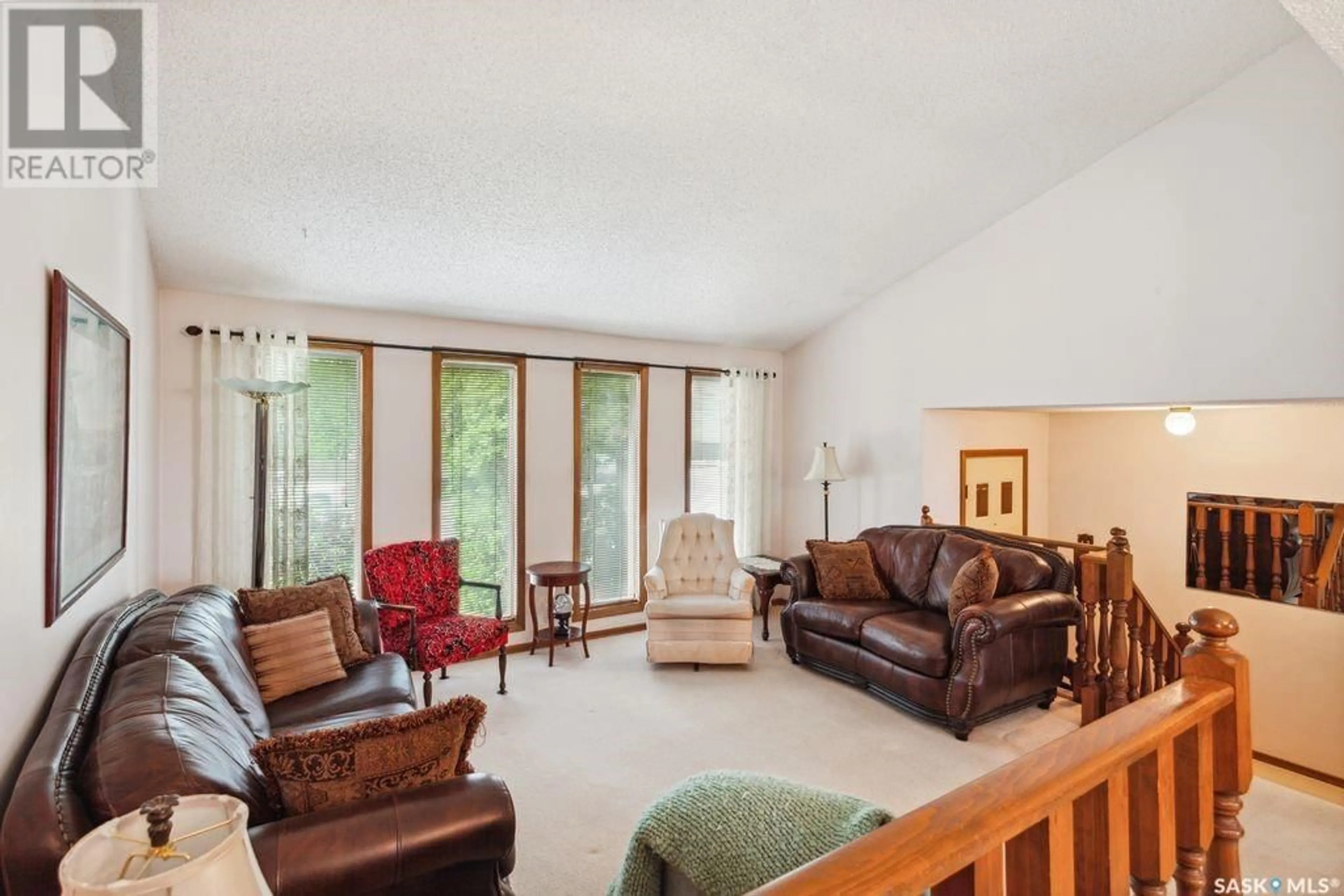 Living room with furniture, unknown for 134 POSTNIKOFF CRESCENT, Saskatoon Saskatchewan S7M4Z3