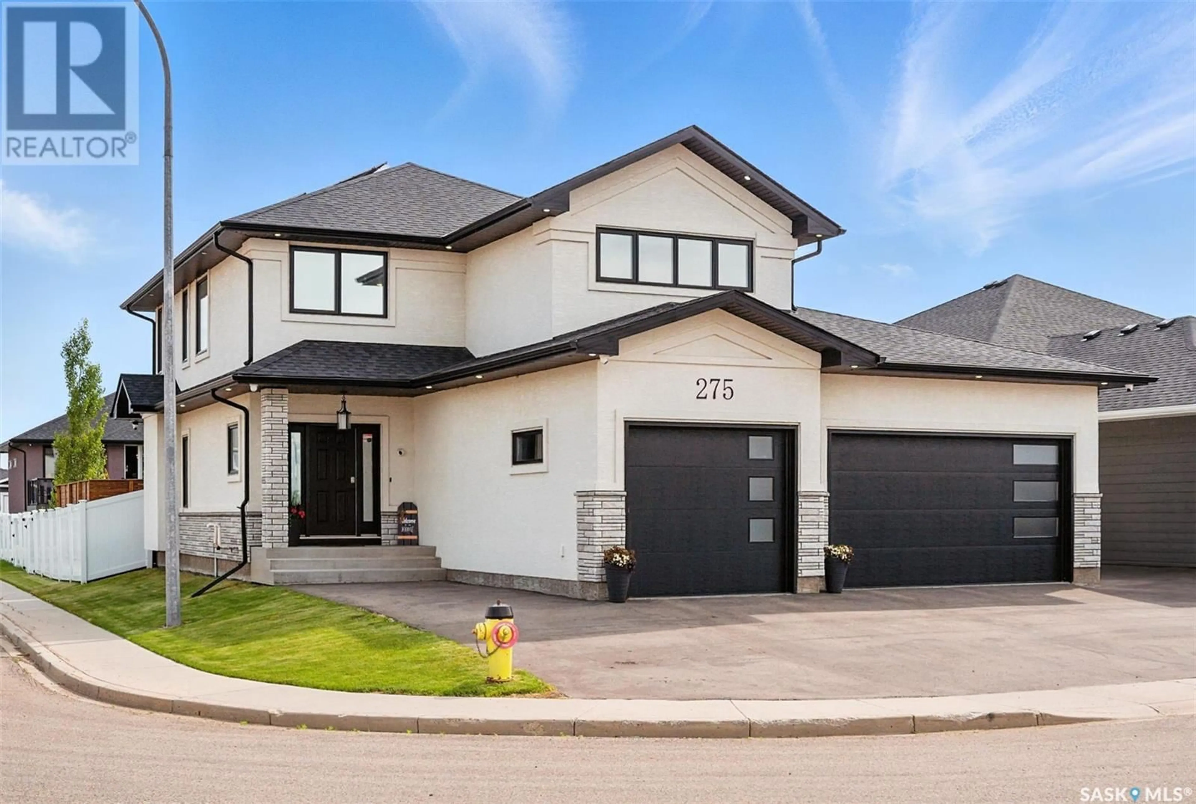 Home with brick exterior material, street for 275 COWAN CRESCENT, Martensville Saskatchewan S0K2T1