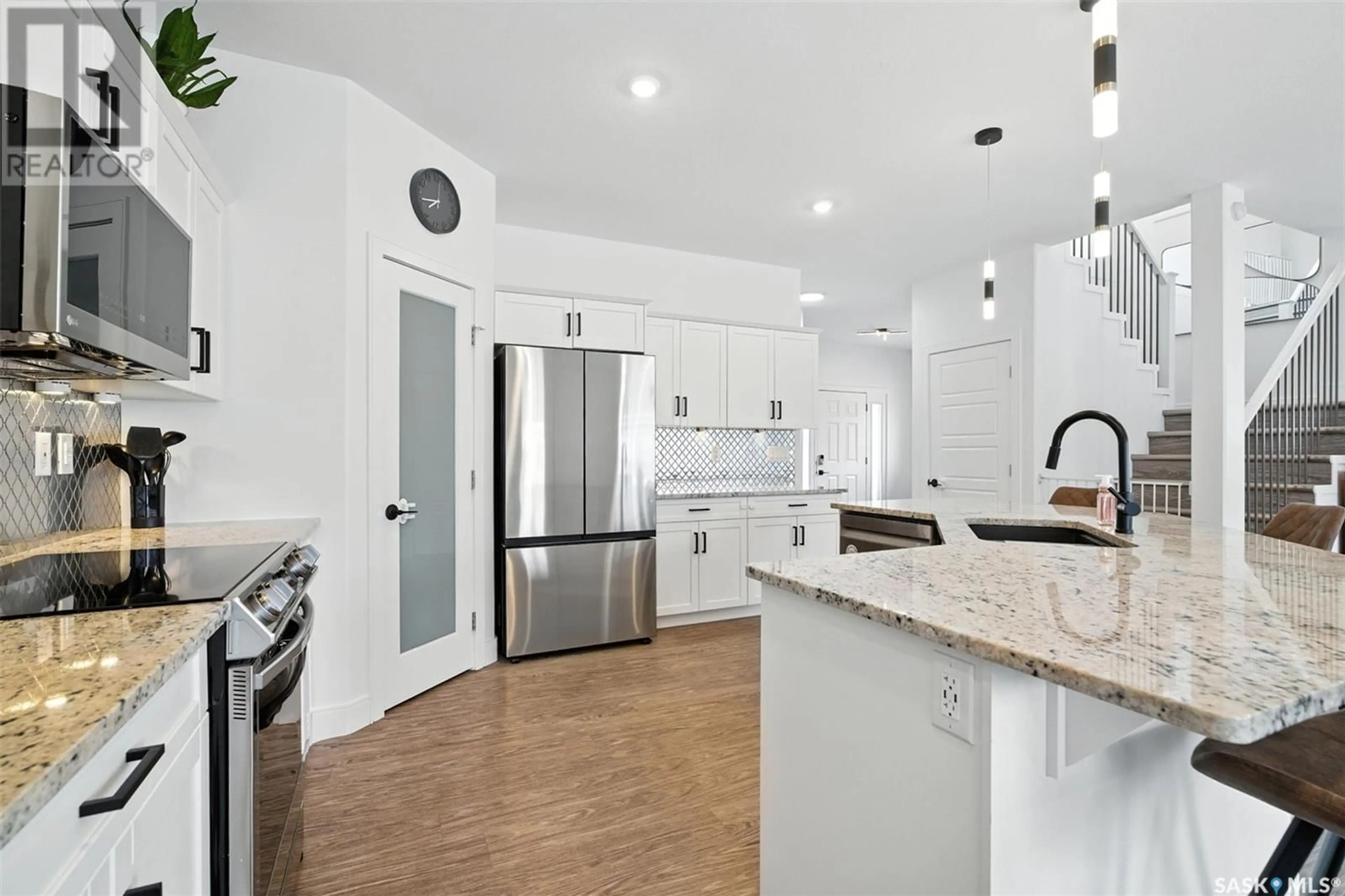 Open concept kitchen, ceramic/tile floor for 275 COWAN CRESCENT, Martensville Saskatchewan S0K2T1