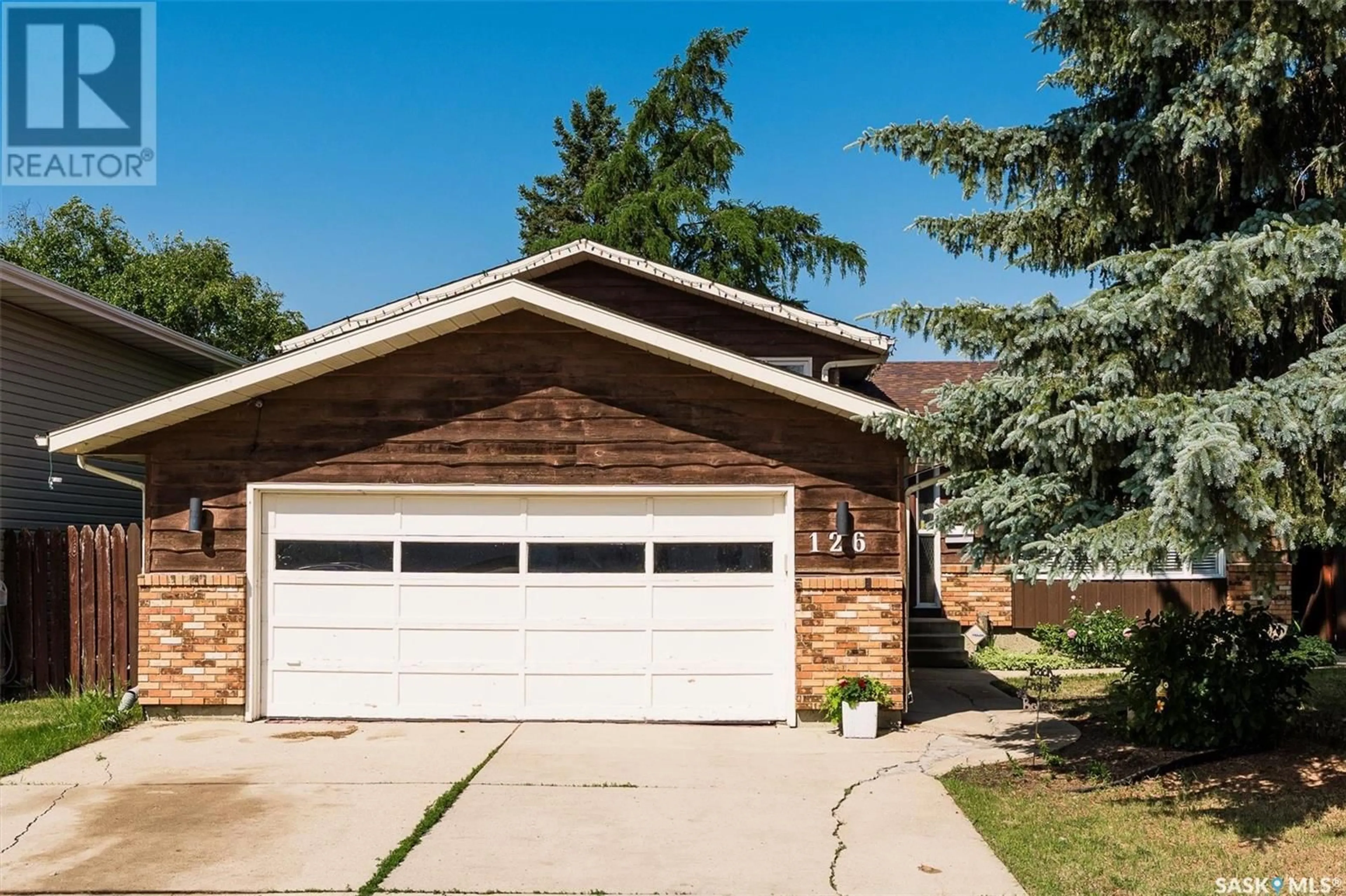 Home with vinyl exterior material, street for 126 KELLINS CRESCENT, Saskatoon Saskatchewan S7N2X6