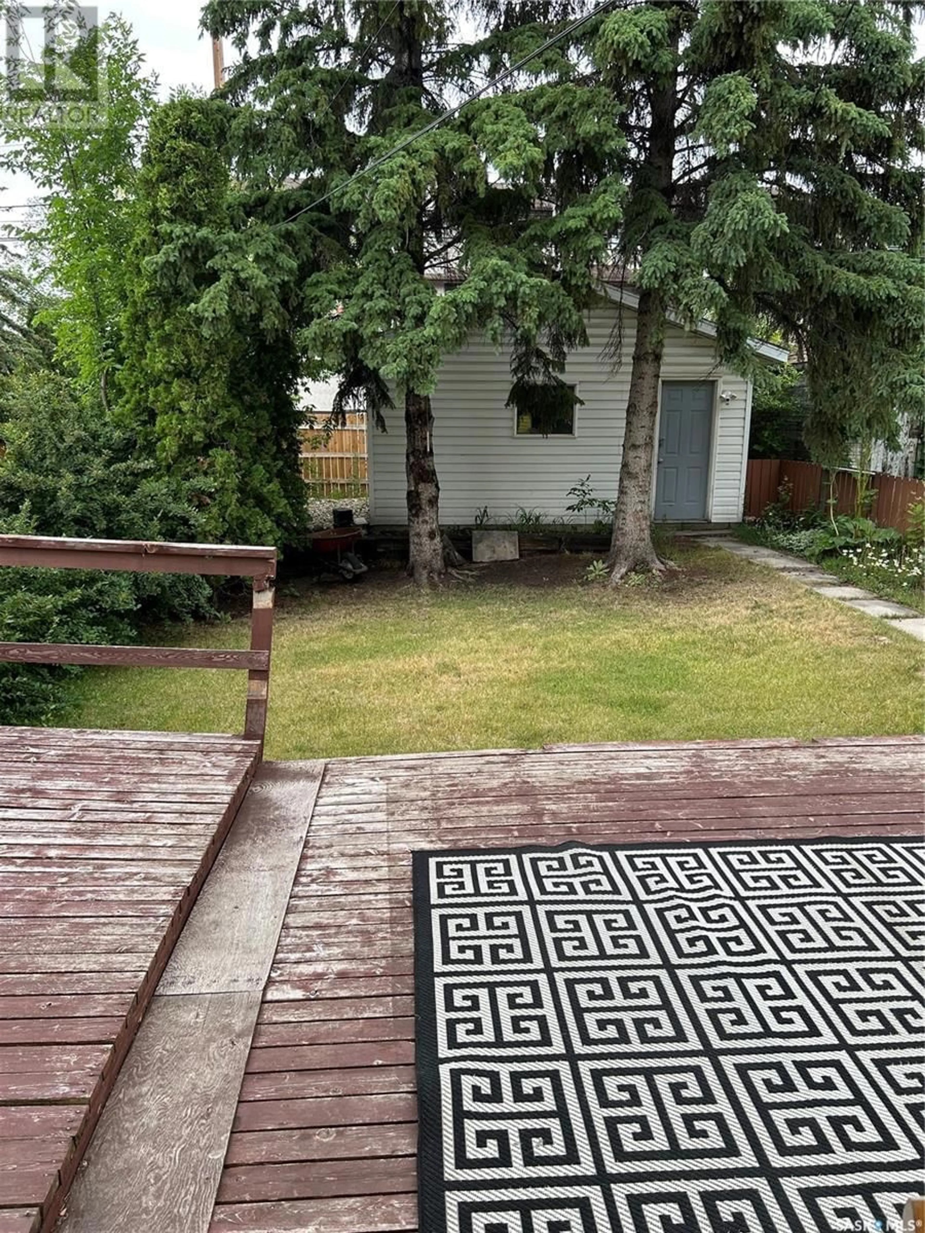Patio, street for 703 7TH STREET, Saskatoon Saskatchewan S7H0Y1