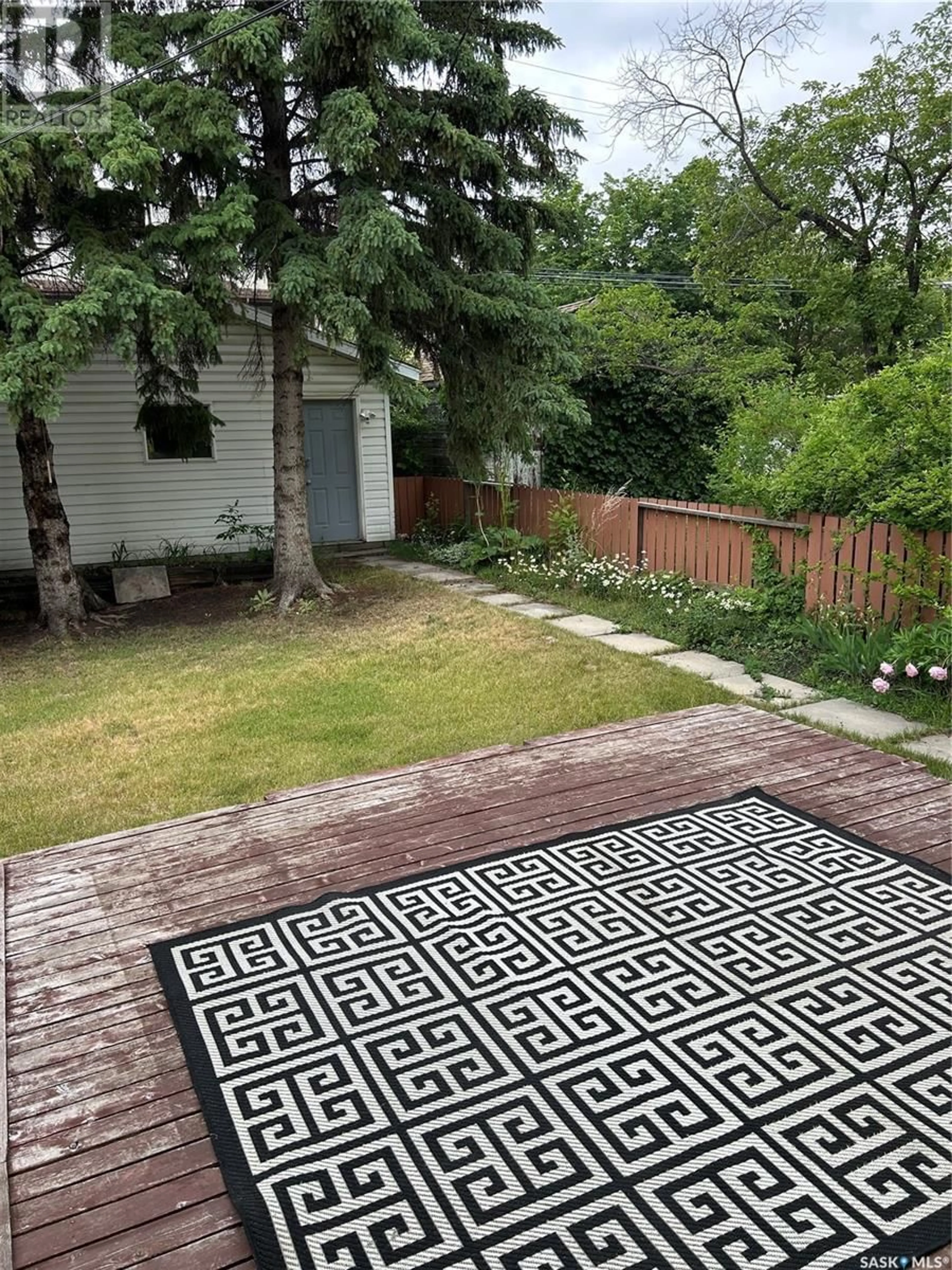 Patio, street for 703 7TH STREET, Saskatoon Saskatchewan S7H0Y1