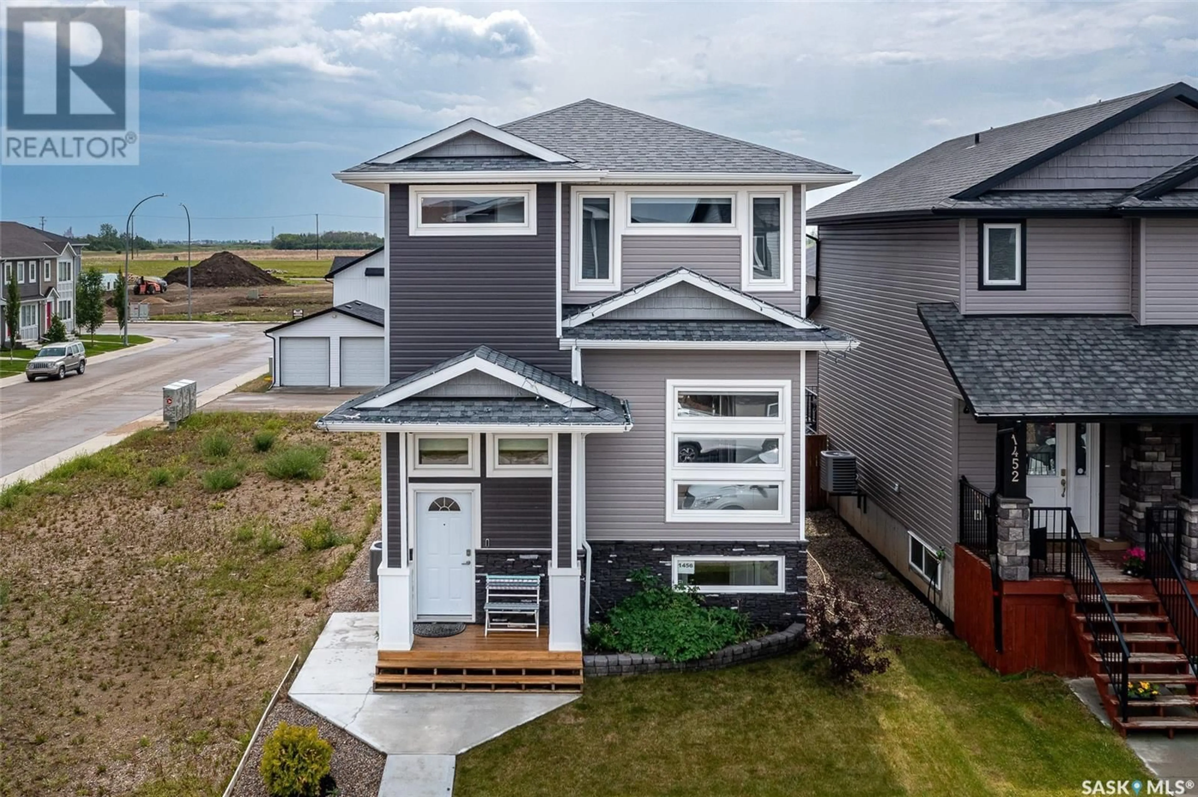 Home with vinyl exterior material, street for 1456 CASSAT DRIVE, Martensville Saskatchewan S0K2T1
