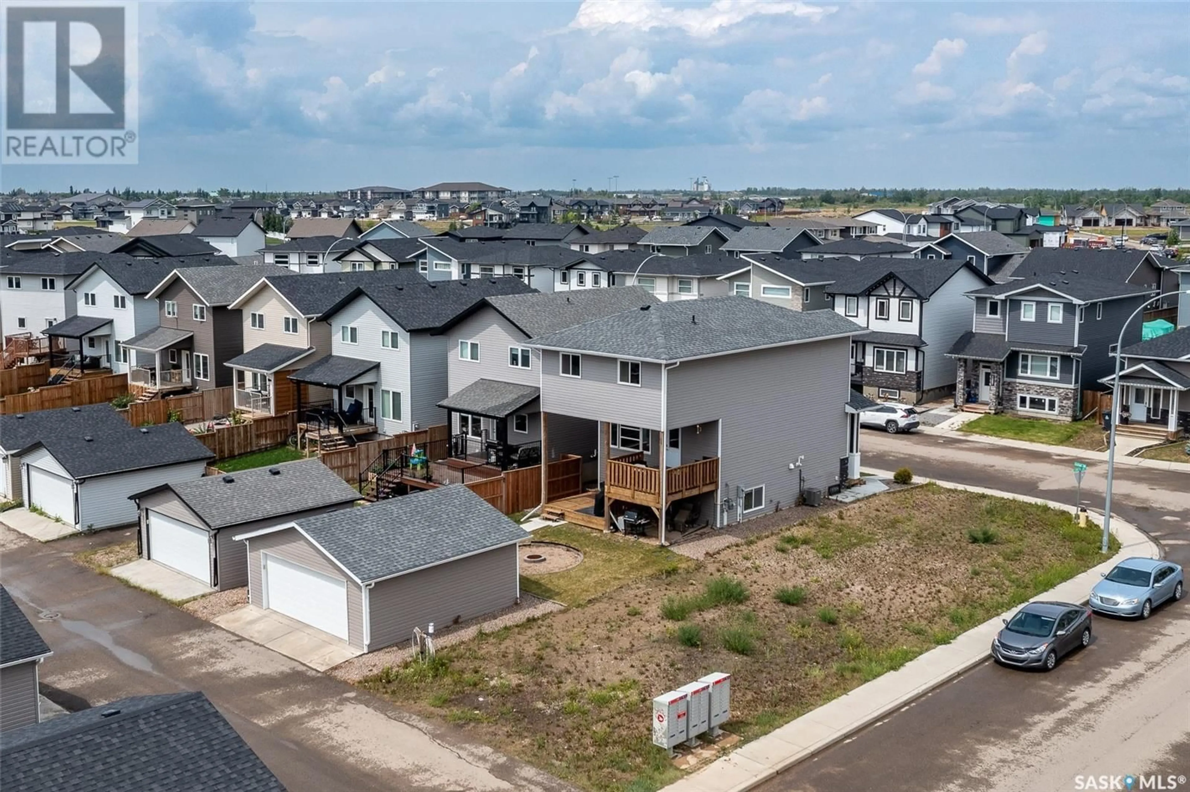 A pic from outside/outdoor area/front of a property/back of a property/a pic from drone, unknown for 1456 CASSAT DRIVE, Martensville Saskatchewan S0K2T1