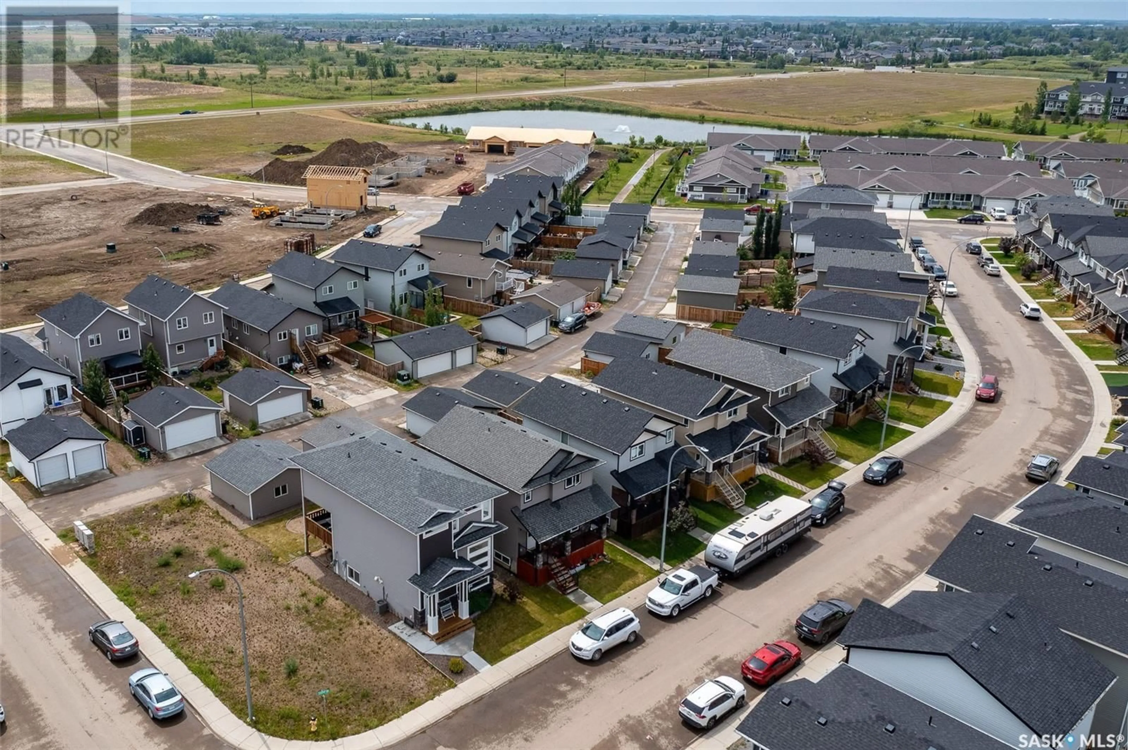 A pic from outside/outdoor area/front of a property/back of a property/a pic from drone, street for 1456 CASSAT DRIVE, Martensville Saskatchewan S0K2T1