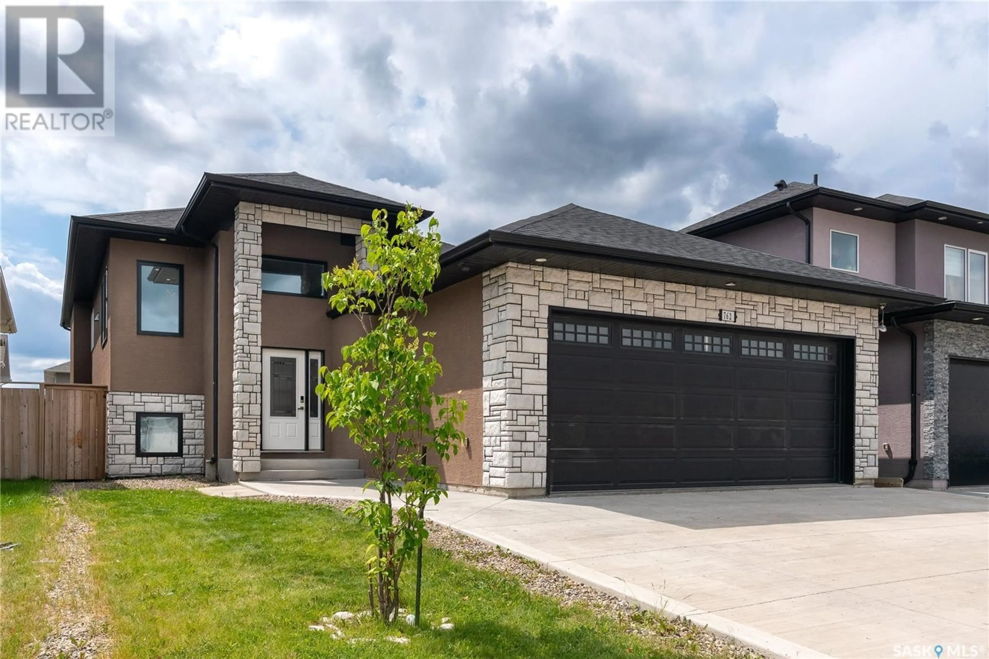 Home with brick exterior material, street for 762 LABINE COURT, Saskatoon Saskatchewan S7L6C8