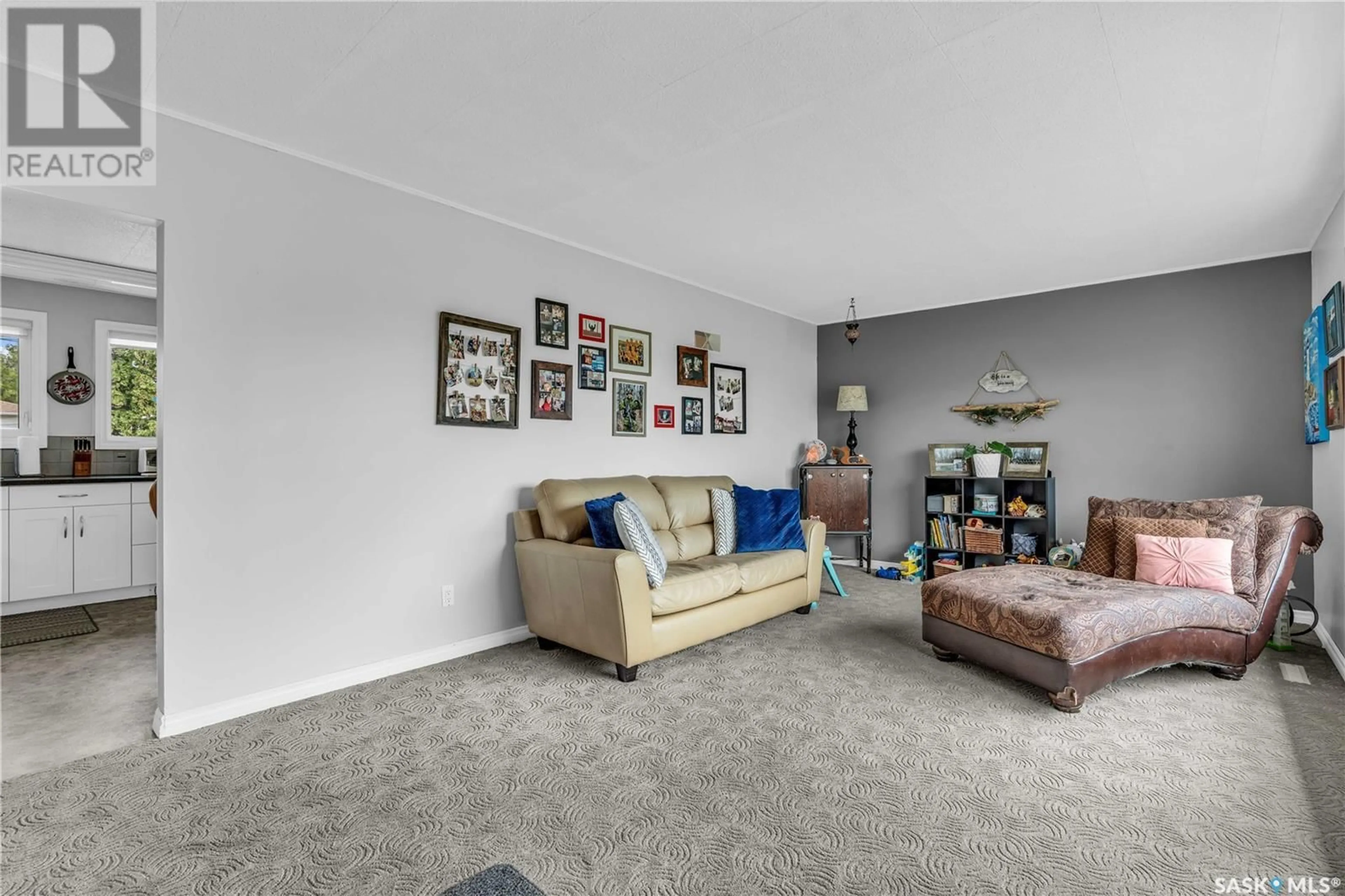 Living room with furniture, carpet floor for 142 26TH STREET, Battleford Saskatchewan S0M0E0