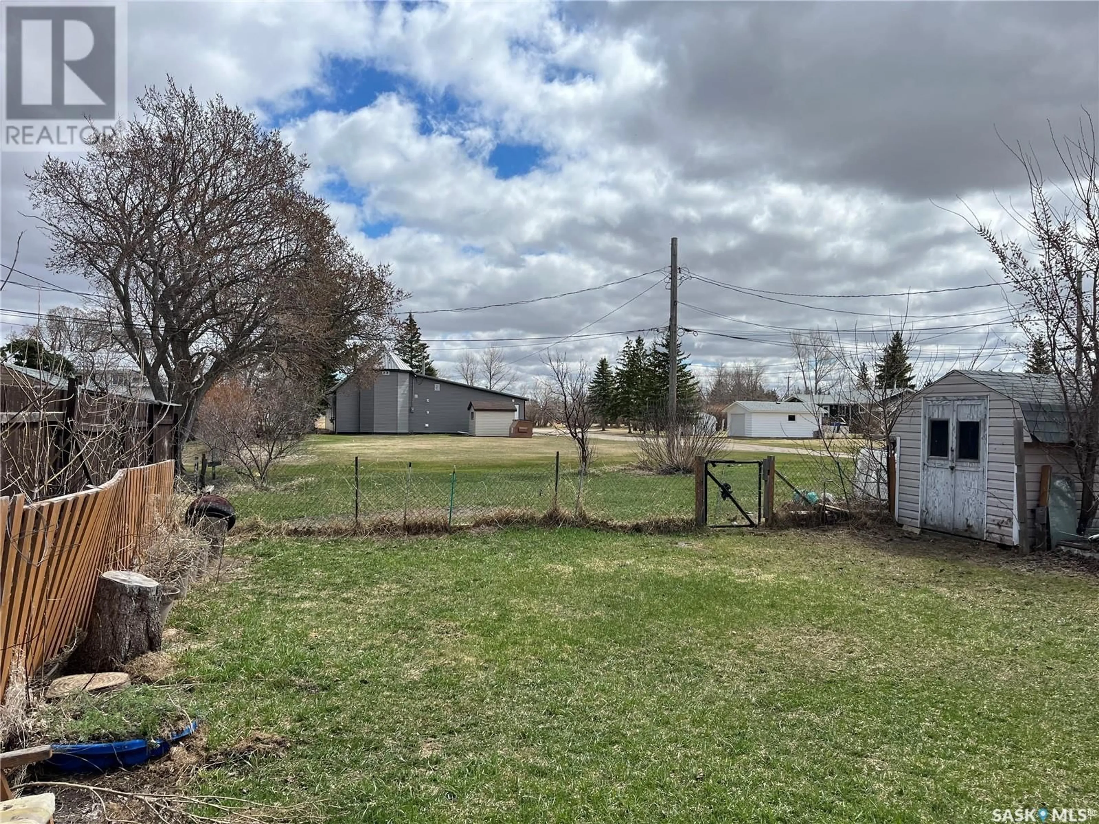 A pic from outside/outdoor area/front of a property/back of a property/a pic from drone, unknown for 317 MOORE STREET, Foam Lake Saskatchewan S0A1A0