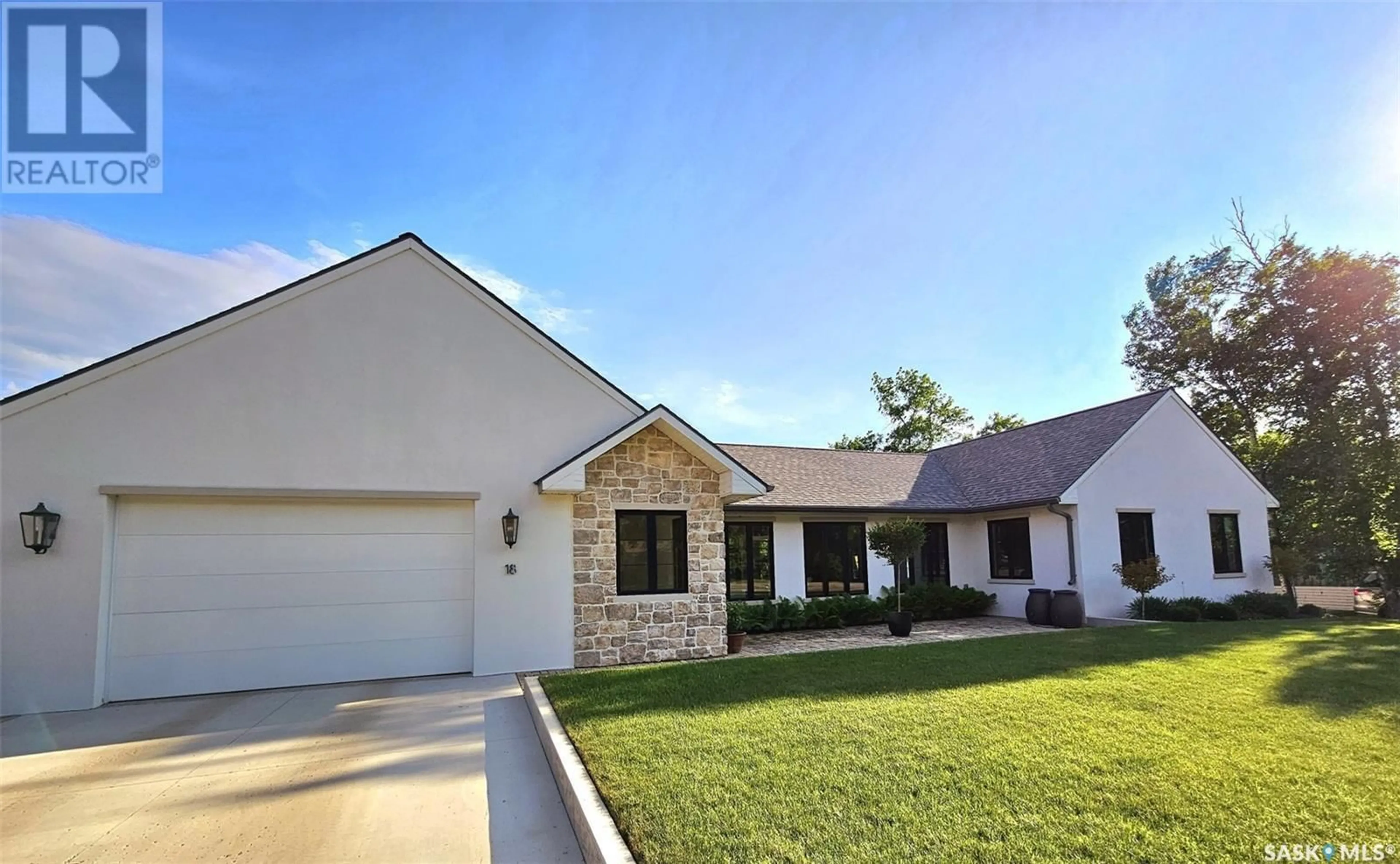 Home with brick exterior material, street for 18 WATZAMATTAU STREET, Kenosee Lake Saskatchewan S0C2S0