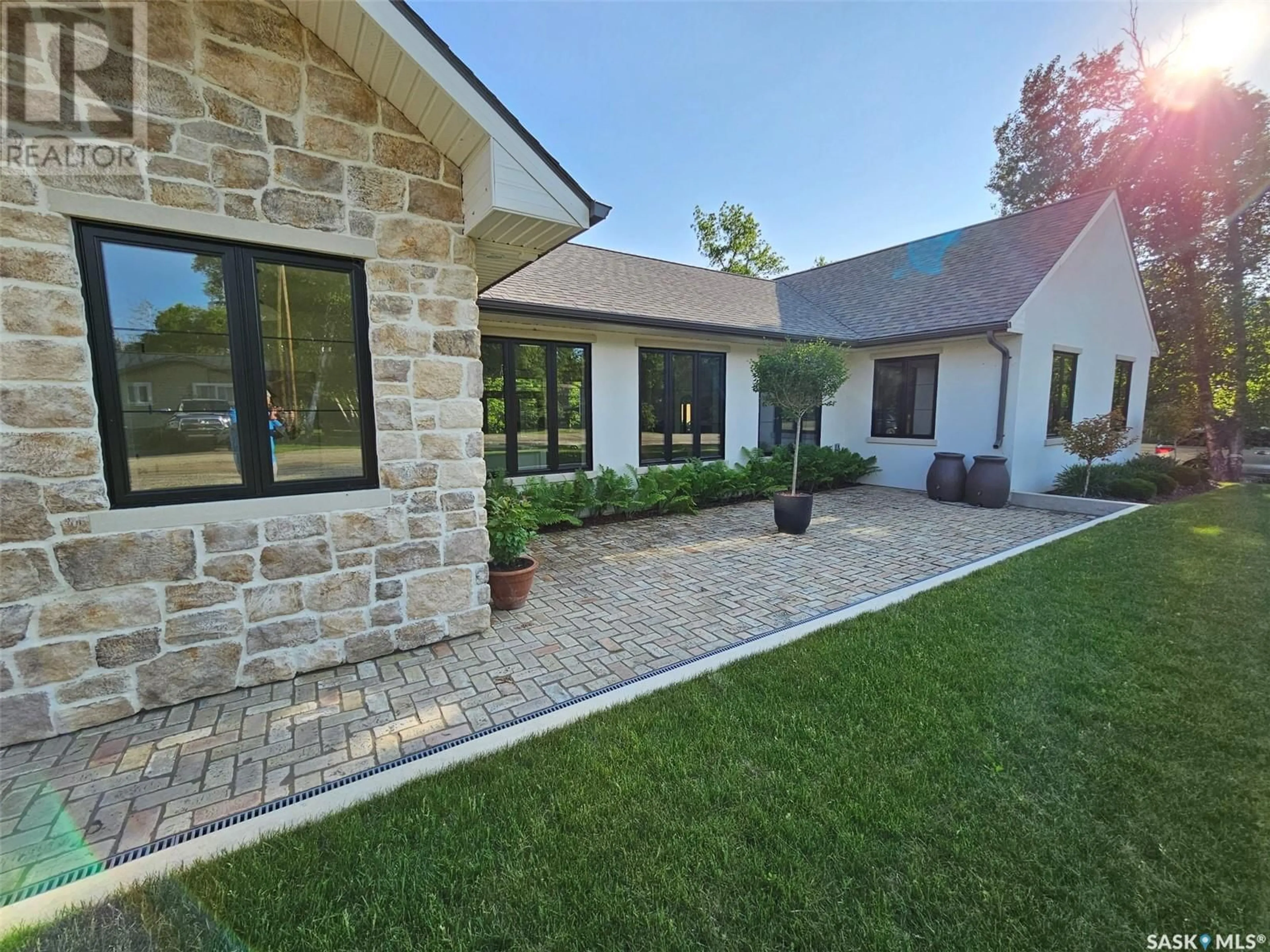 Home with brick exterior material, street for 18 WATZAMATTAU STREET, Kenosee Lake Saskatchewan S0C2S0