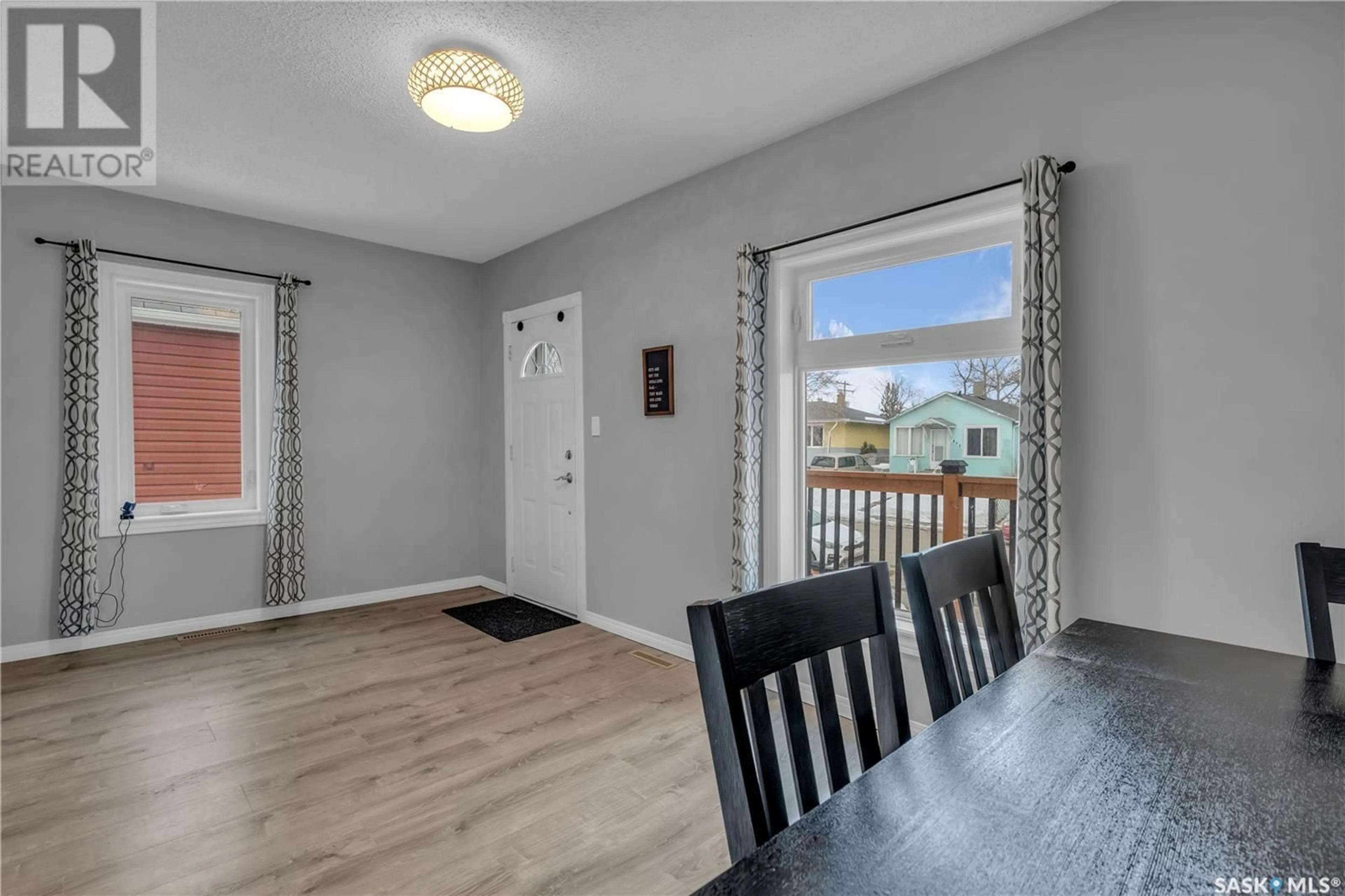 Dining room, wood/laminate floor for 445 YORK STREET, Regina Saskatchewan S4R4W7