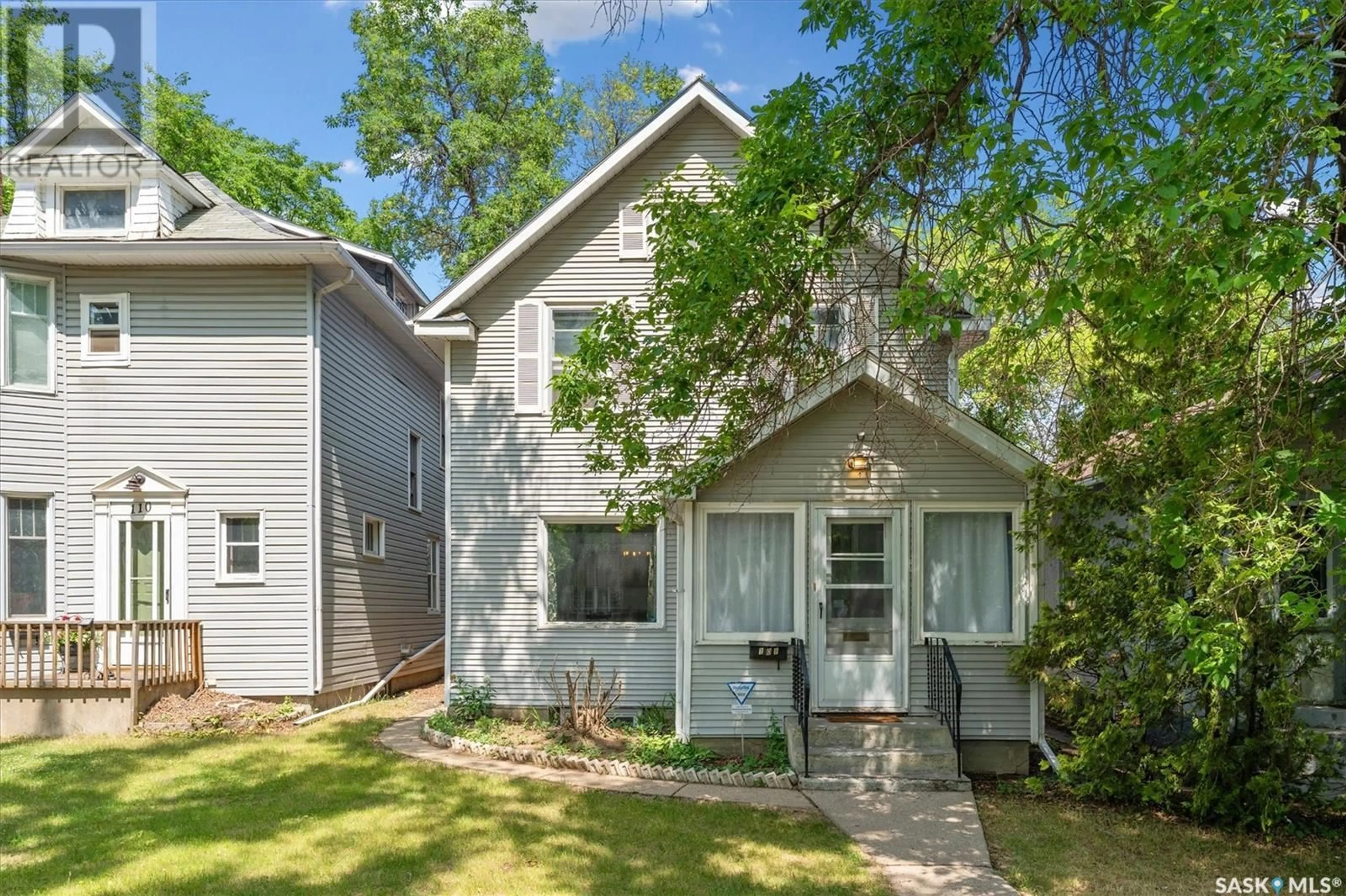 Home with vinyl exterior material, street for 108 31ST STREET, Saskatoon Saskatchewan S7L0P5