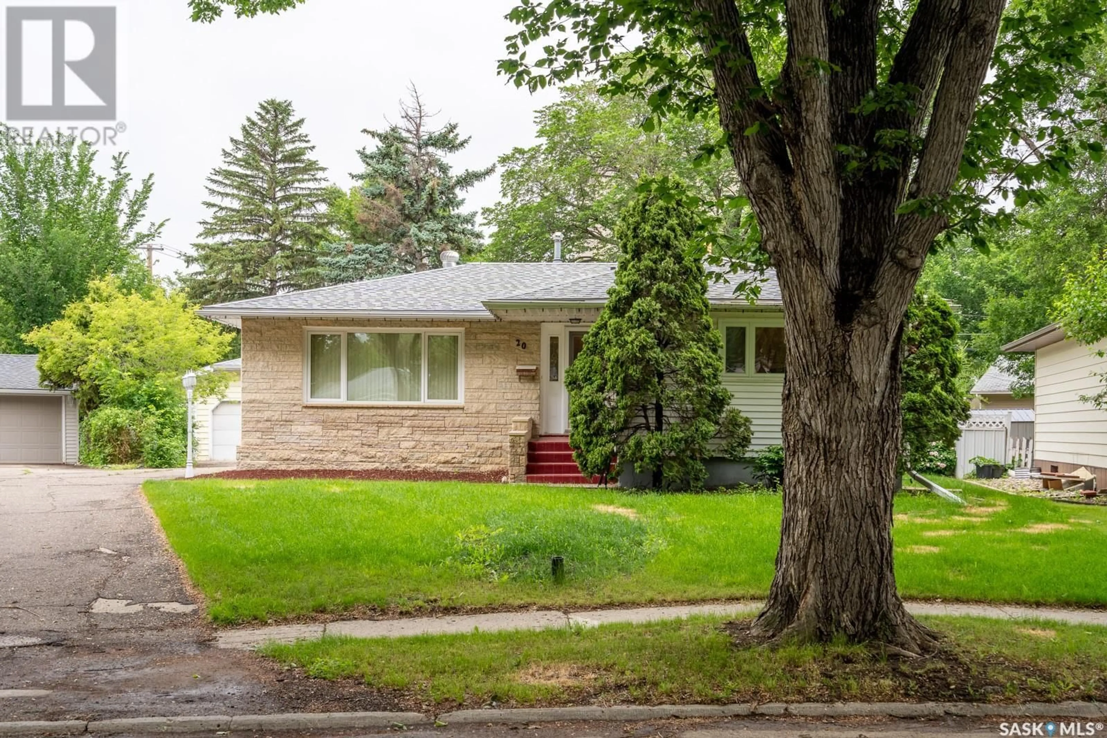 Home with vinyl exterior material, street for 20 DUNNING CRESCENT, Regina Saskatchewan S4S3W1
