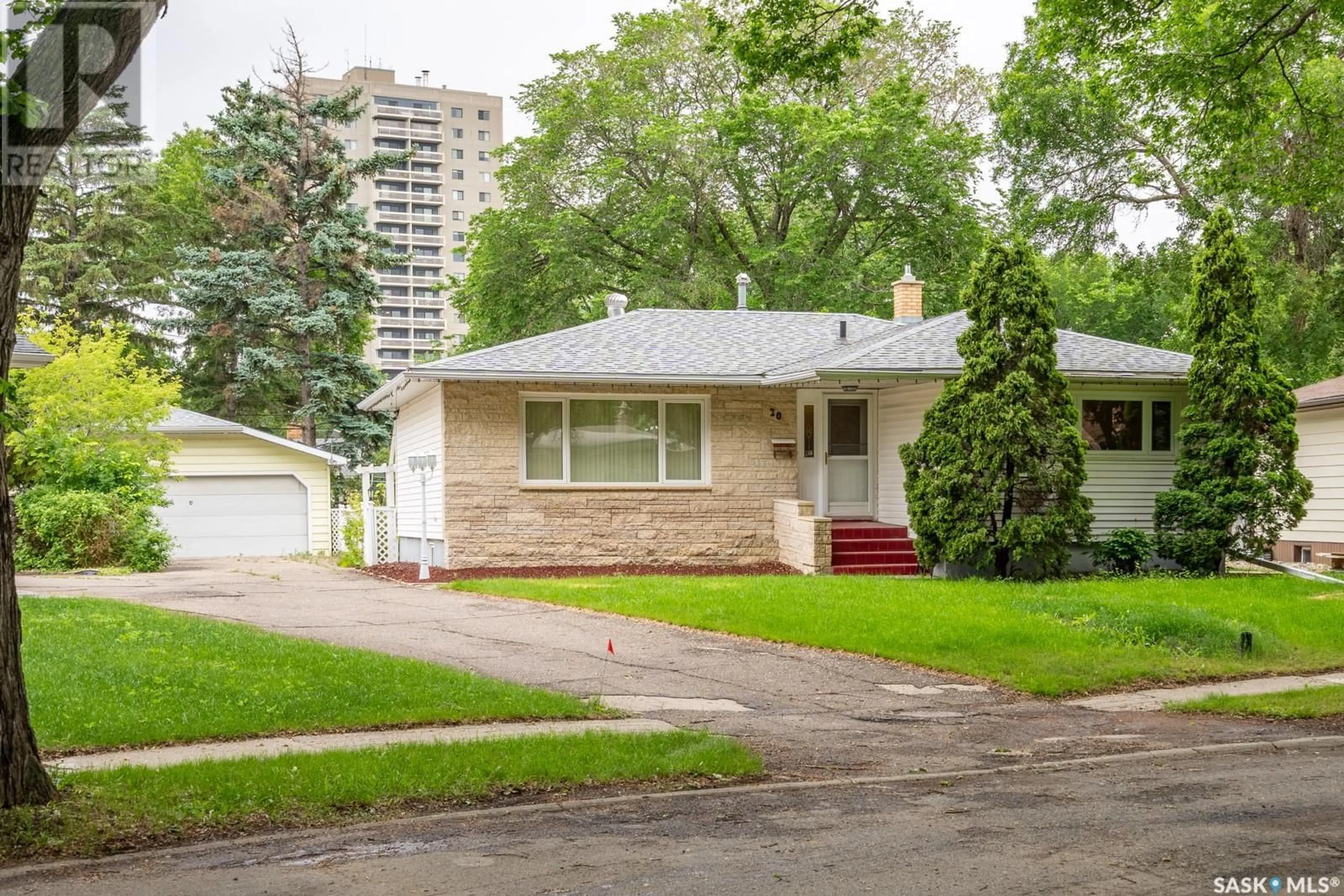 Home with vinyl exterior material, street for 20 DUNNING CRESCENT, Regina Saskatchewan S4S3W1