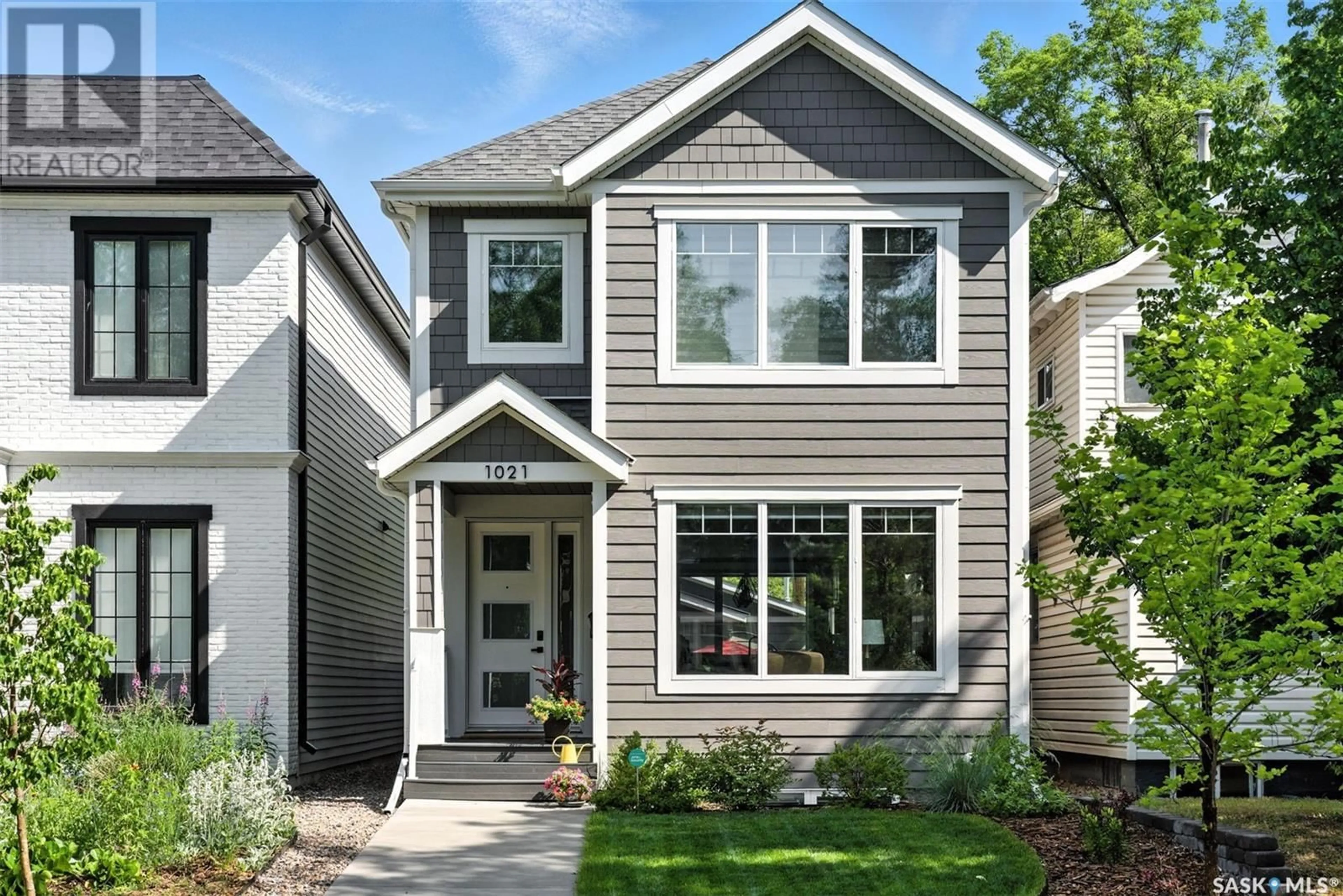 Home with vinyl exterior material, street for 1021 AIRD STREET, Saskatoon Saskatchewan S7N0S9