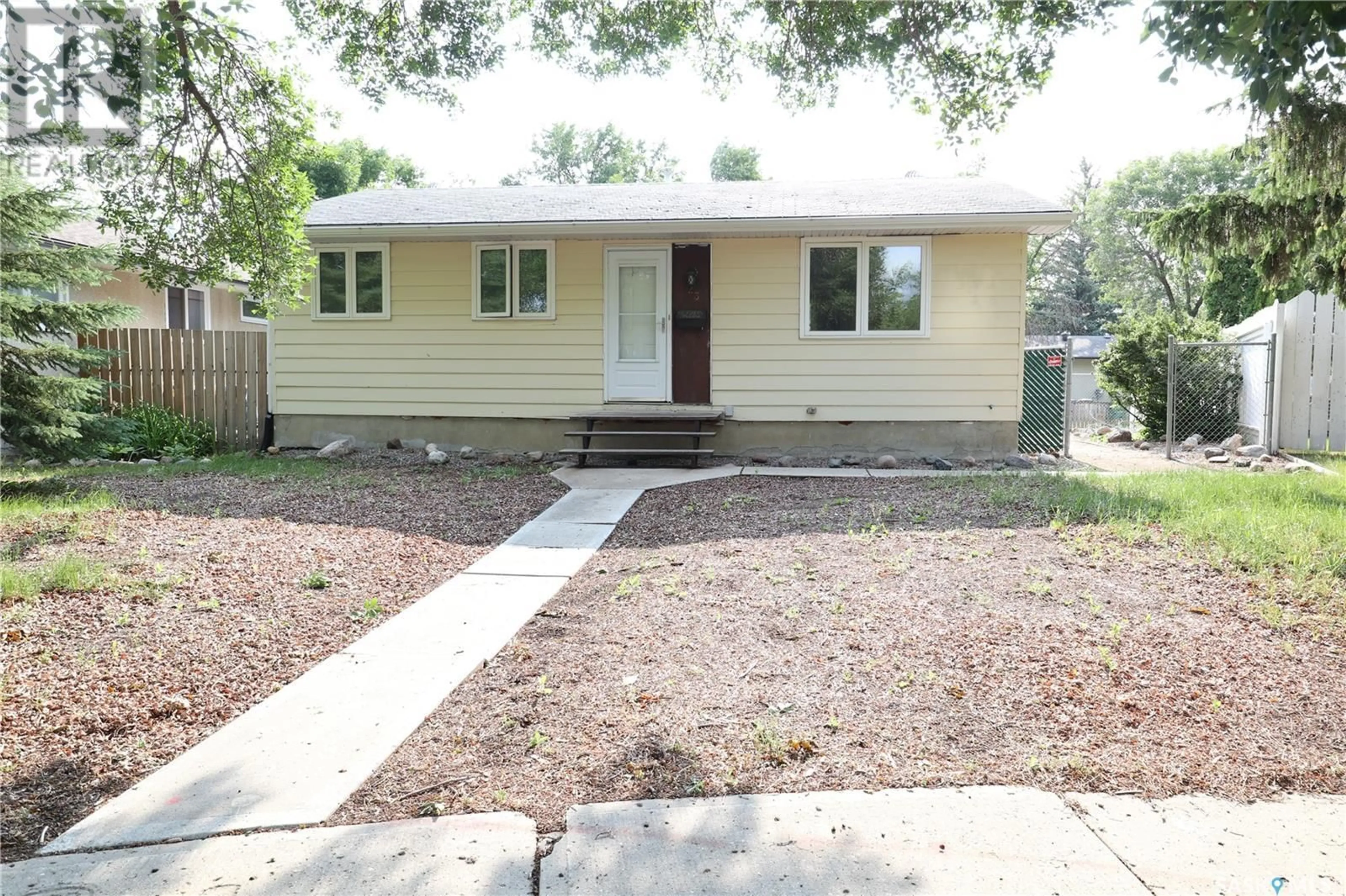Home with vinyl exterior material, street for 23 OSBORNE CRESCENT, Regina Saskatchewan S4R5J2