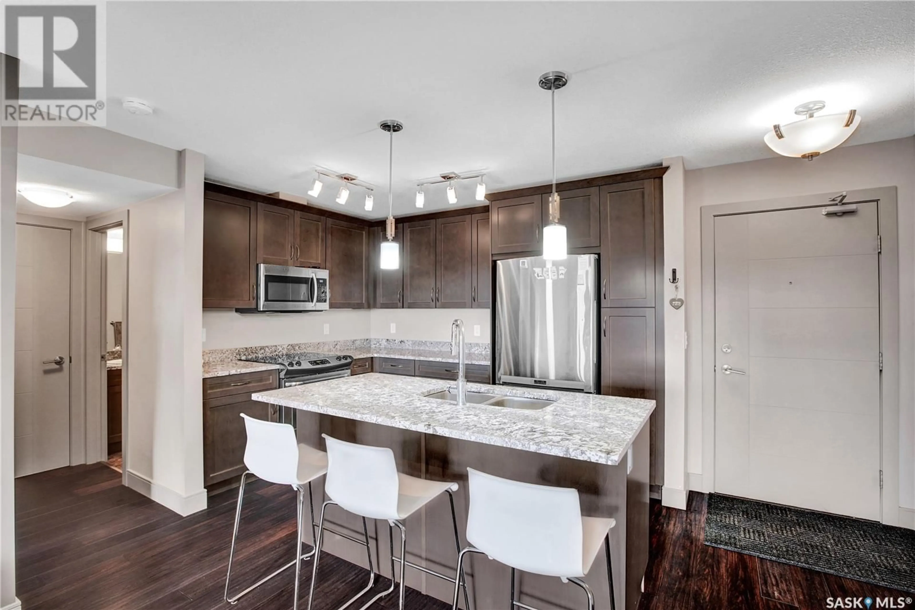 Open concept kitchen, ceramic/tile floor for 121 - 325 WILLOWGROVE CRESCENT, Saskatoon Saskatchewan S7W0R1