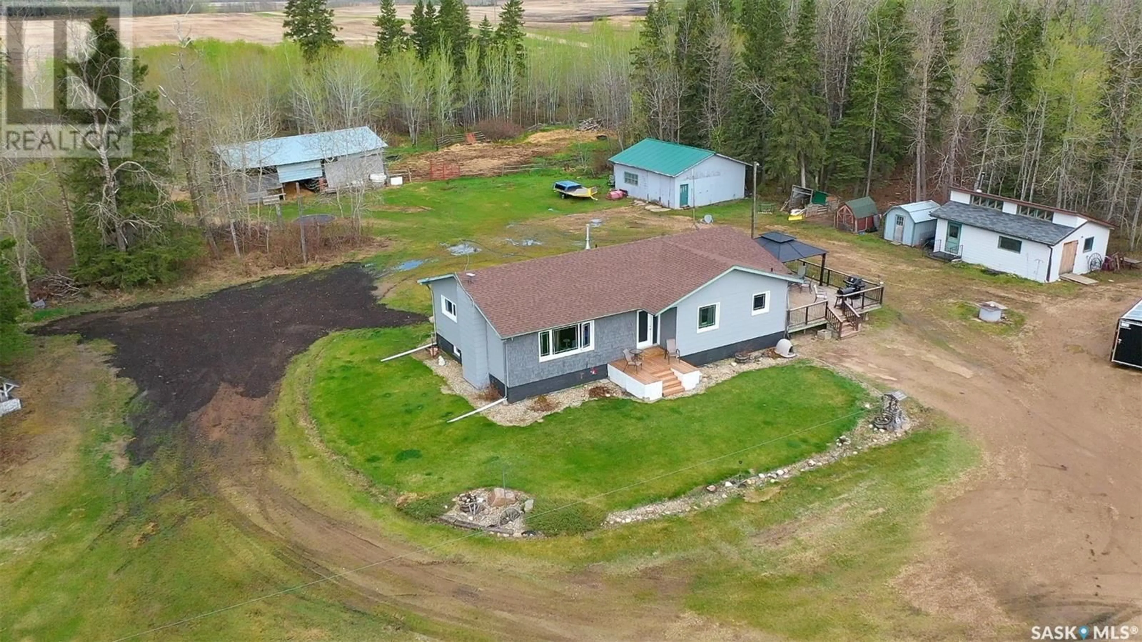 A pic from outside/outdoor area/front of a property/back of a property/a pic from drone, unknown for JANSEN ACREAGE, Clayton Rm No. 333 Saskatchewan S3N3X0