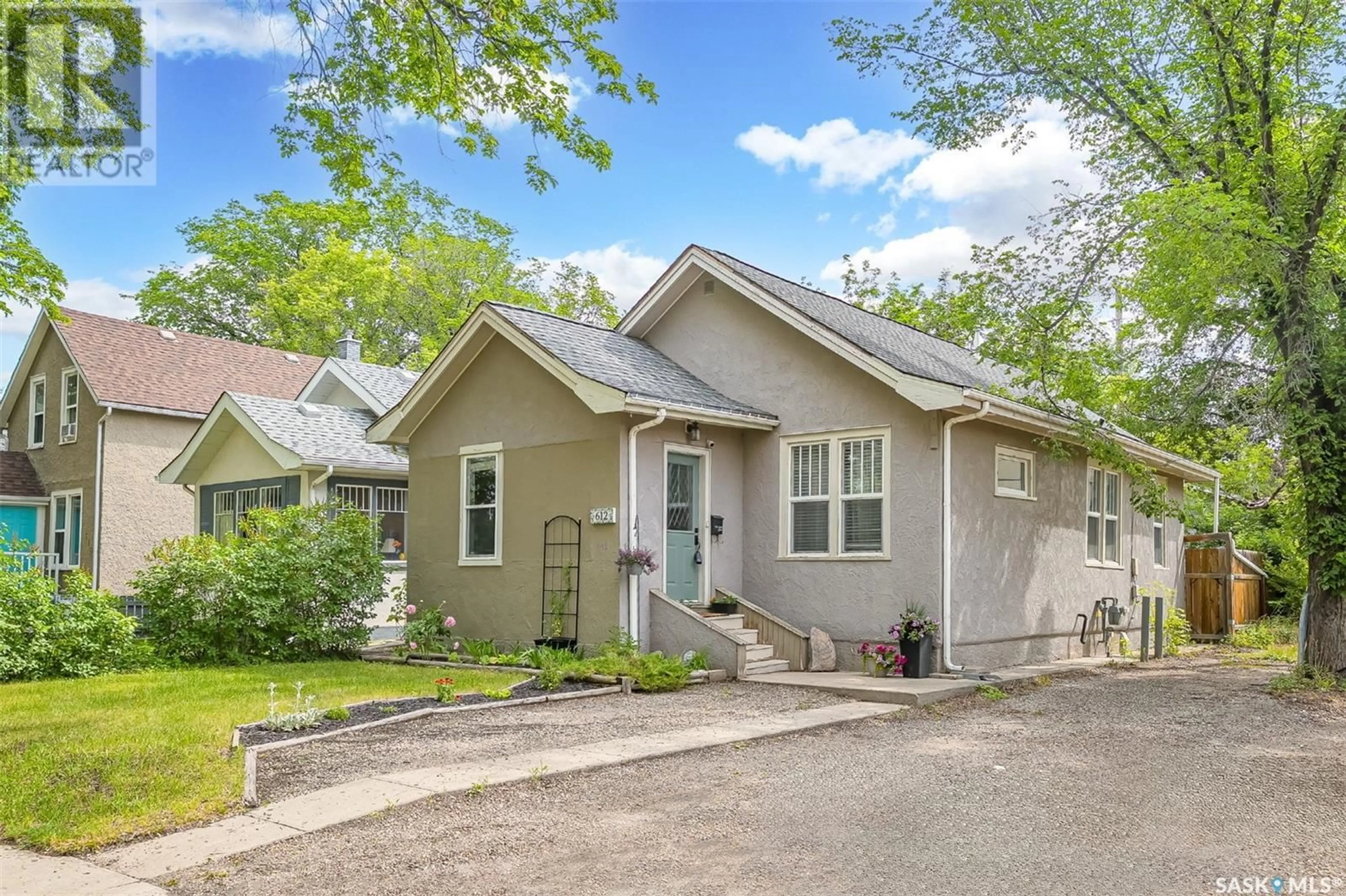 Home with vinyl exterior material, street for 612 5TH AVENUE, Saskatoon Saskatchewan S7K2R4