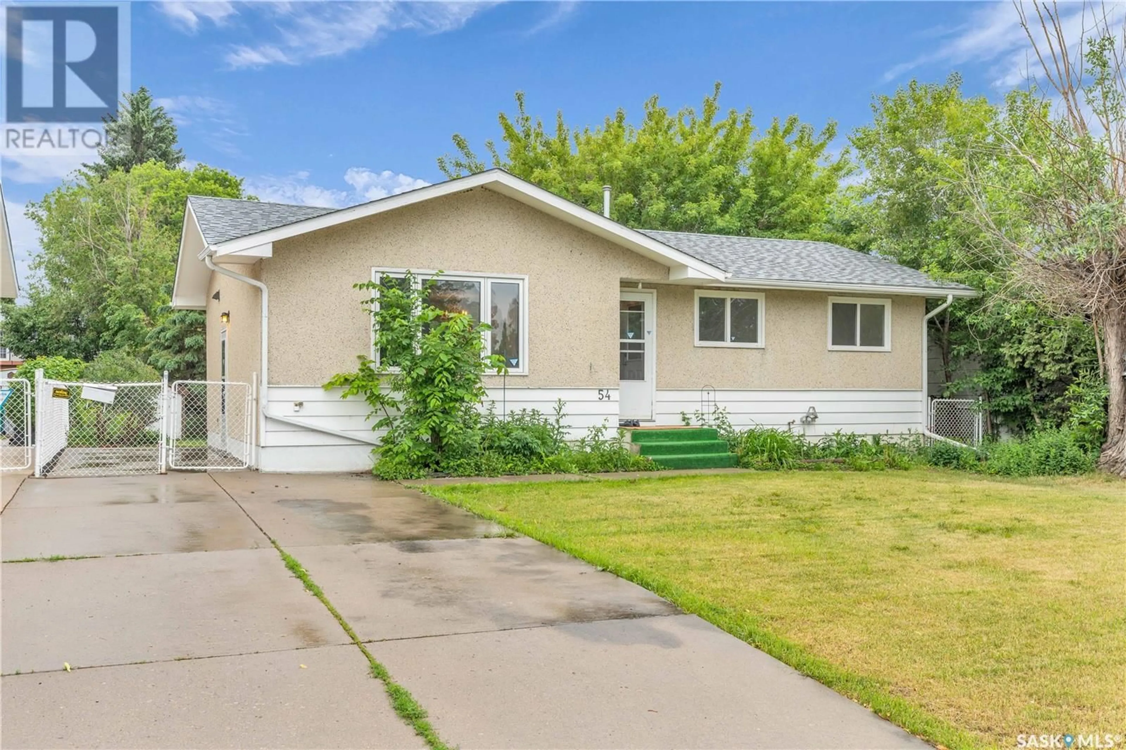 Home with vinyl exterior material, street for 54 MACKIE CRESCENT, Saskatoon Saskatchewan S7L3V3