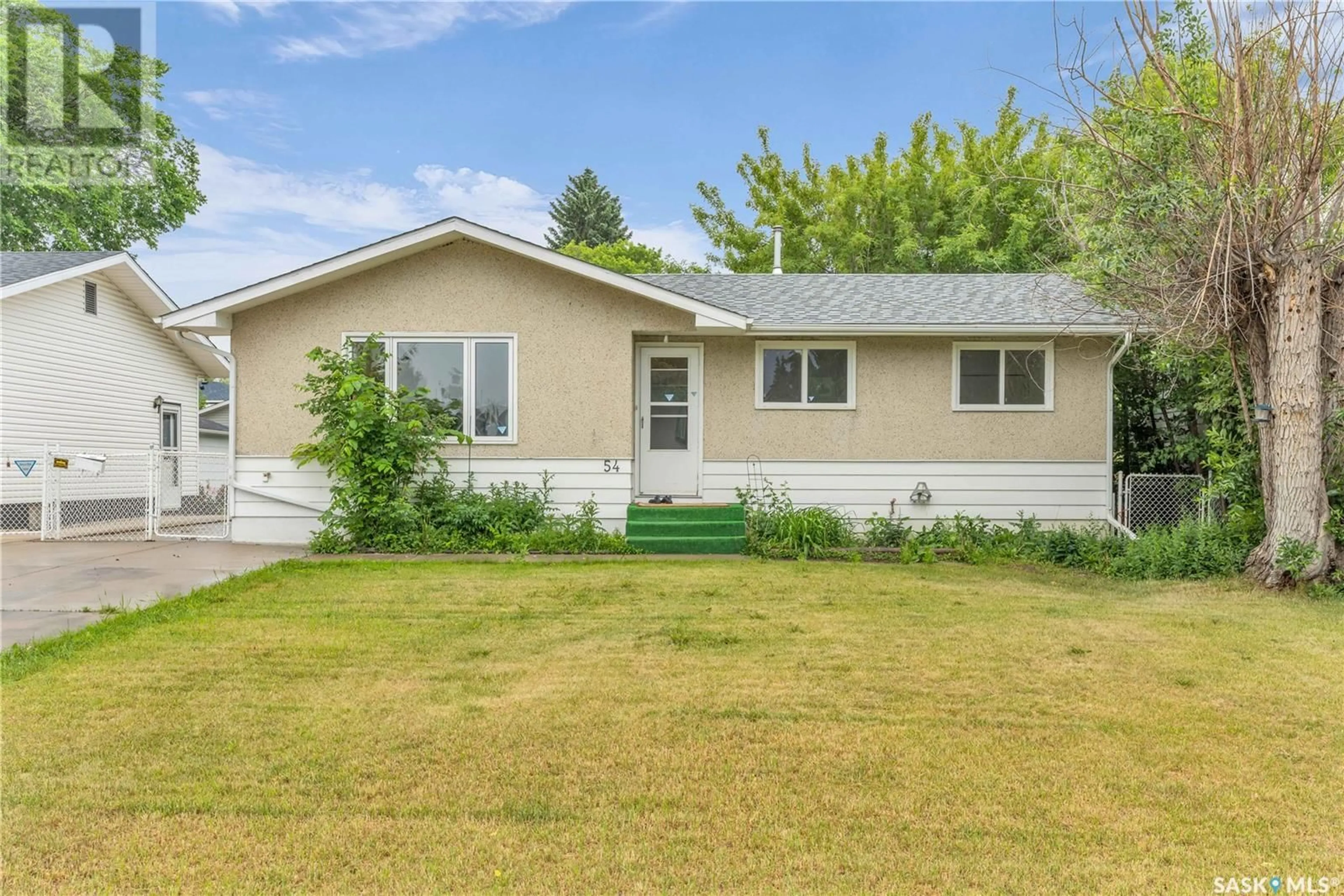 Home with vinyl exterior material, street for 54 MACKIE CRESCENT, Saskatoon Saskatchewan S7L3V3