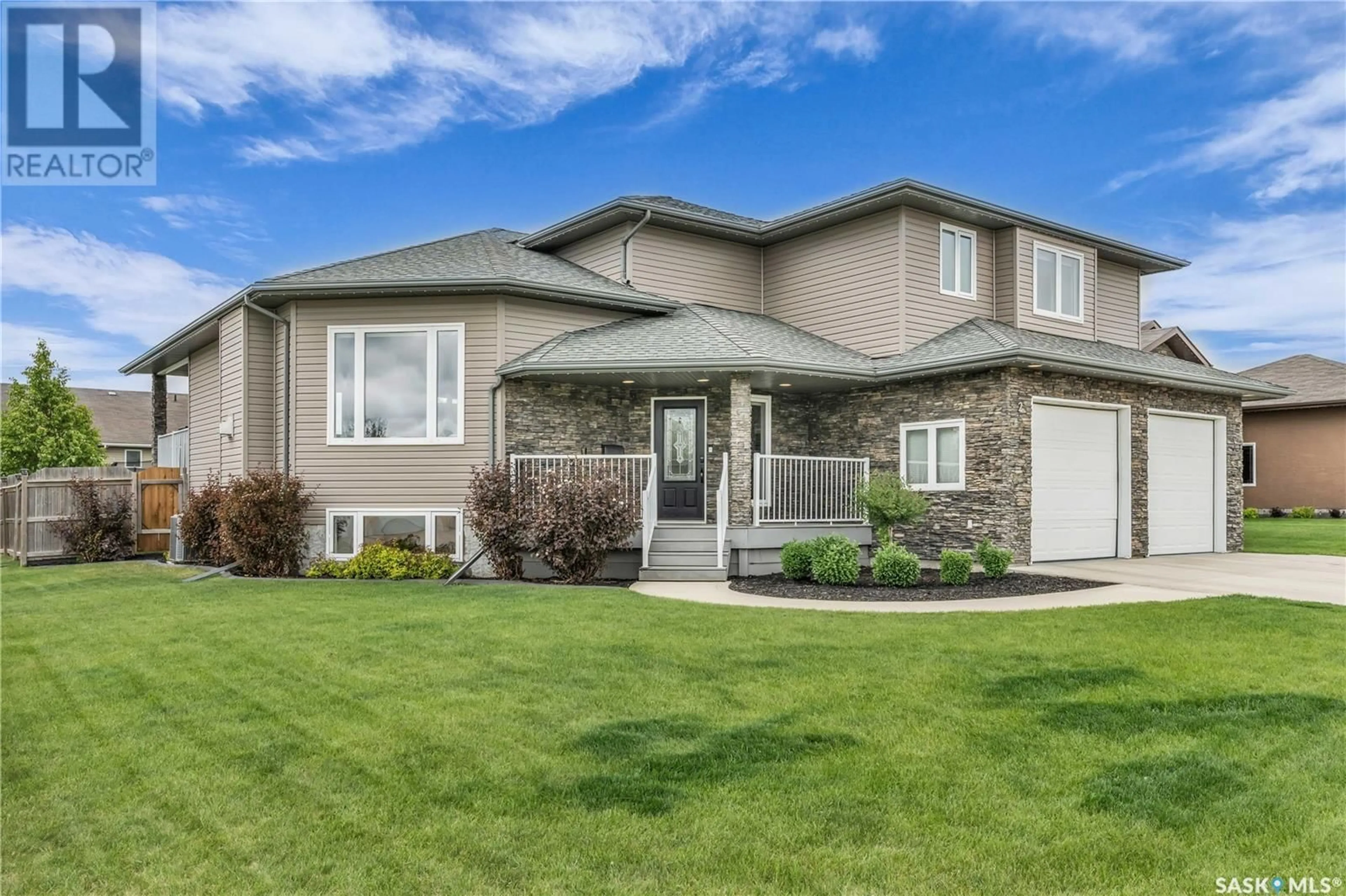 Home with vinyl exterior material, street for 2 FOUHSE DRIVE, Humboldt Saskatchewan S0K2A0