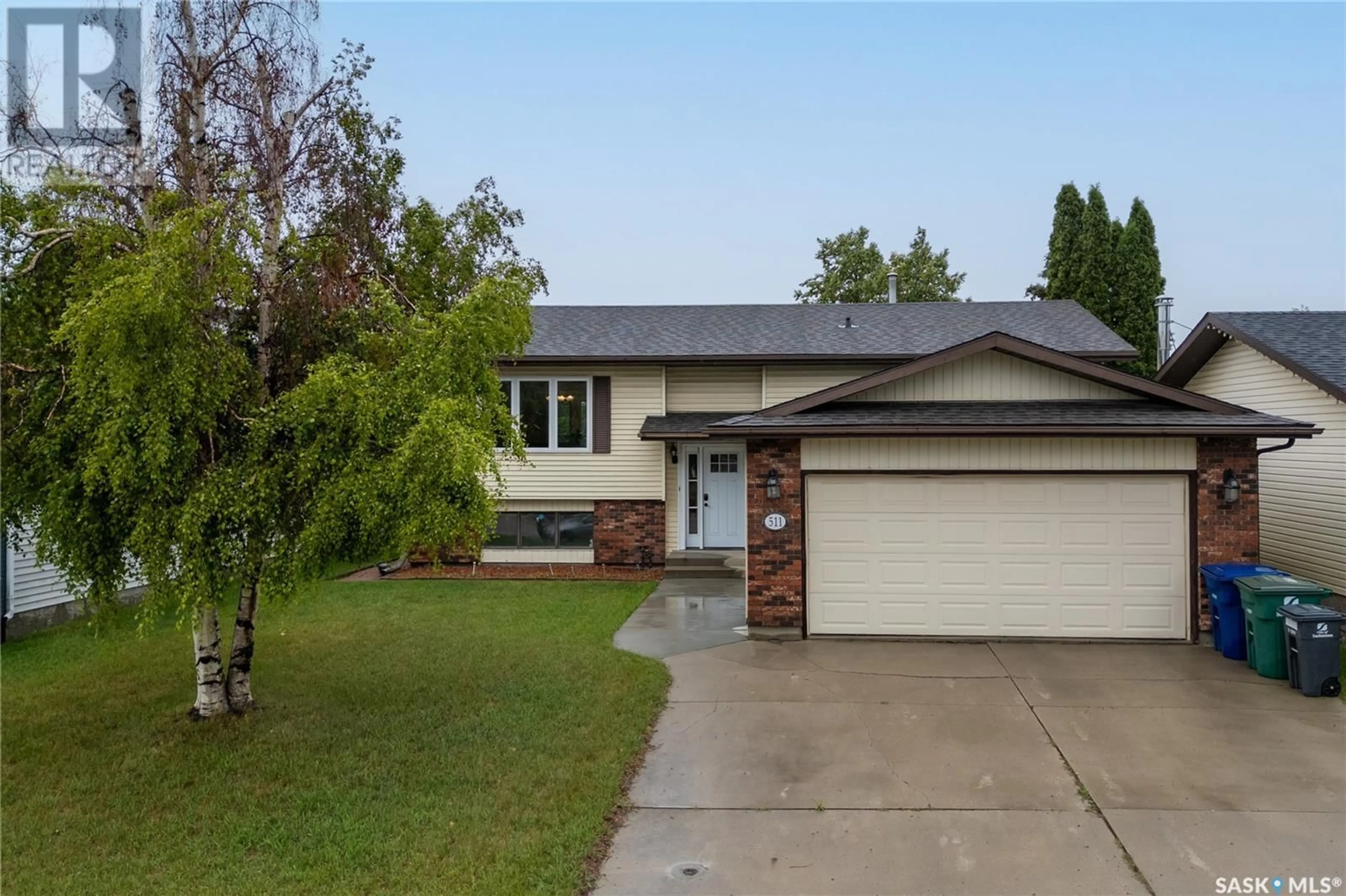 Home with vinyl exterior material, street for 511 NORDSTRUM ROAD, Saskatoon Saskatchewan S7K7X9