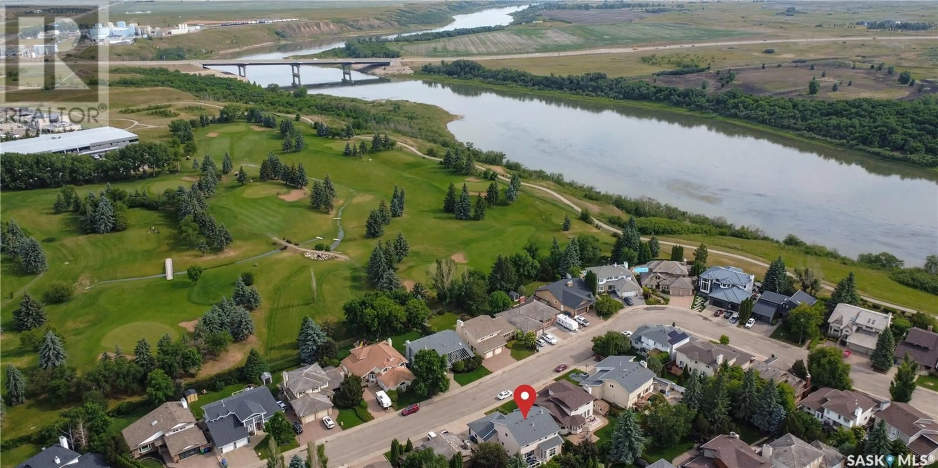 A pic from outside/outdoor area/front of a property/back of a property/a pic from drone, water/lake/river/ocean view for 214 MALLIN CRESCENT, Saskatoon Saskatchewan S7K7X1