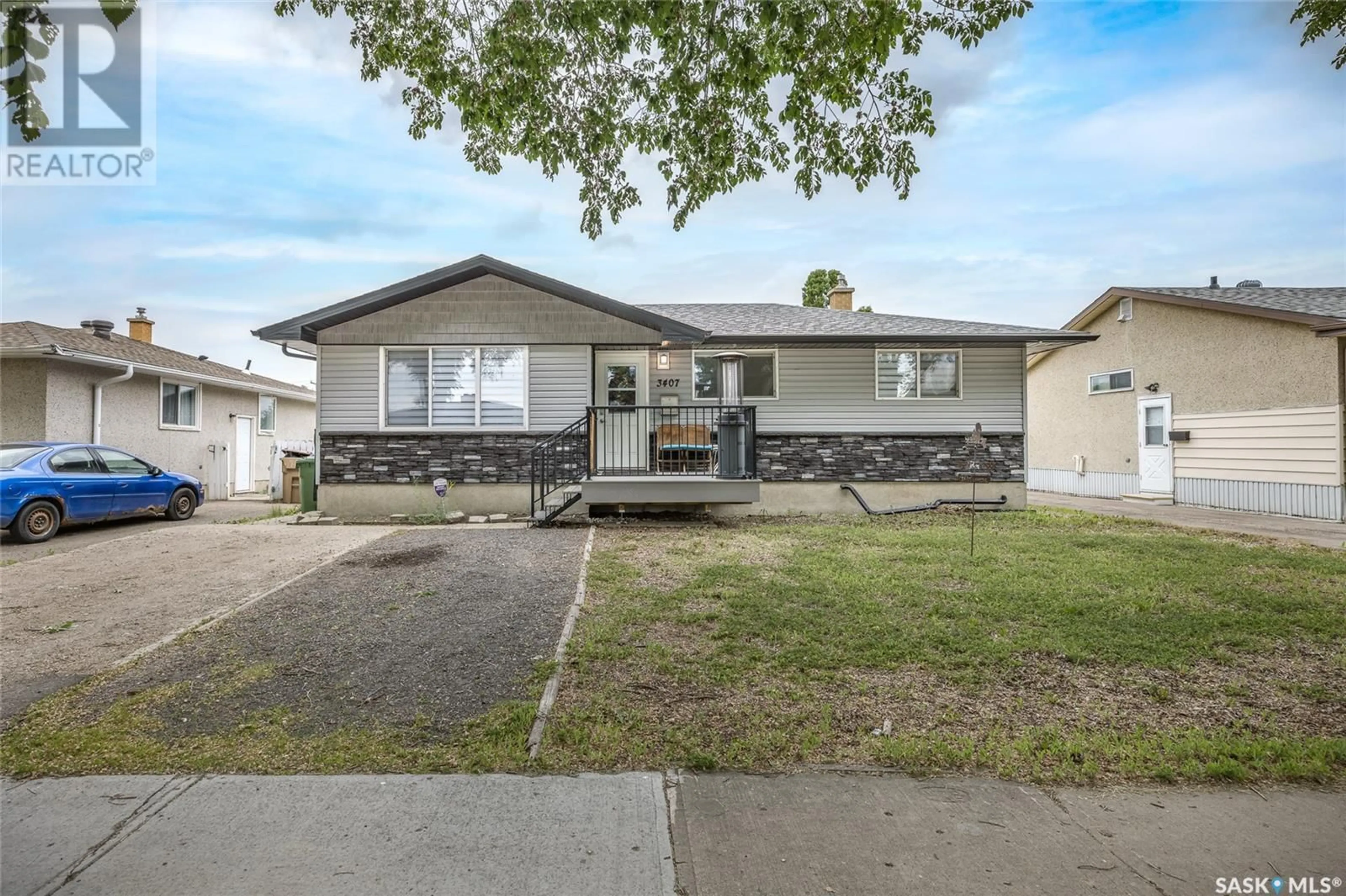 Home with vinyl exterior material, street for 3407 6TH AVENUE, Regina Saskatchewan S4R0P7